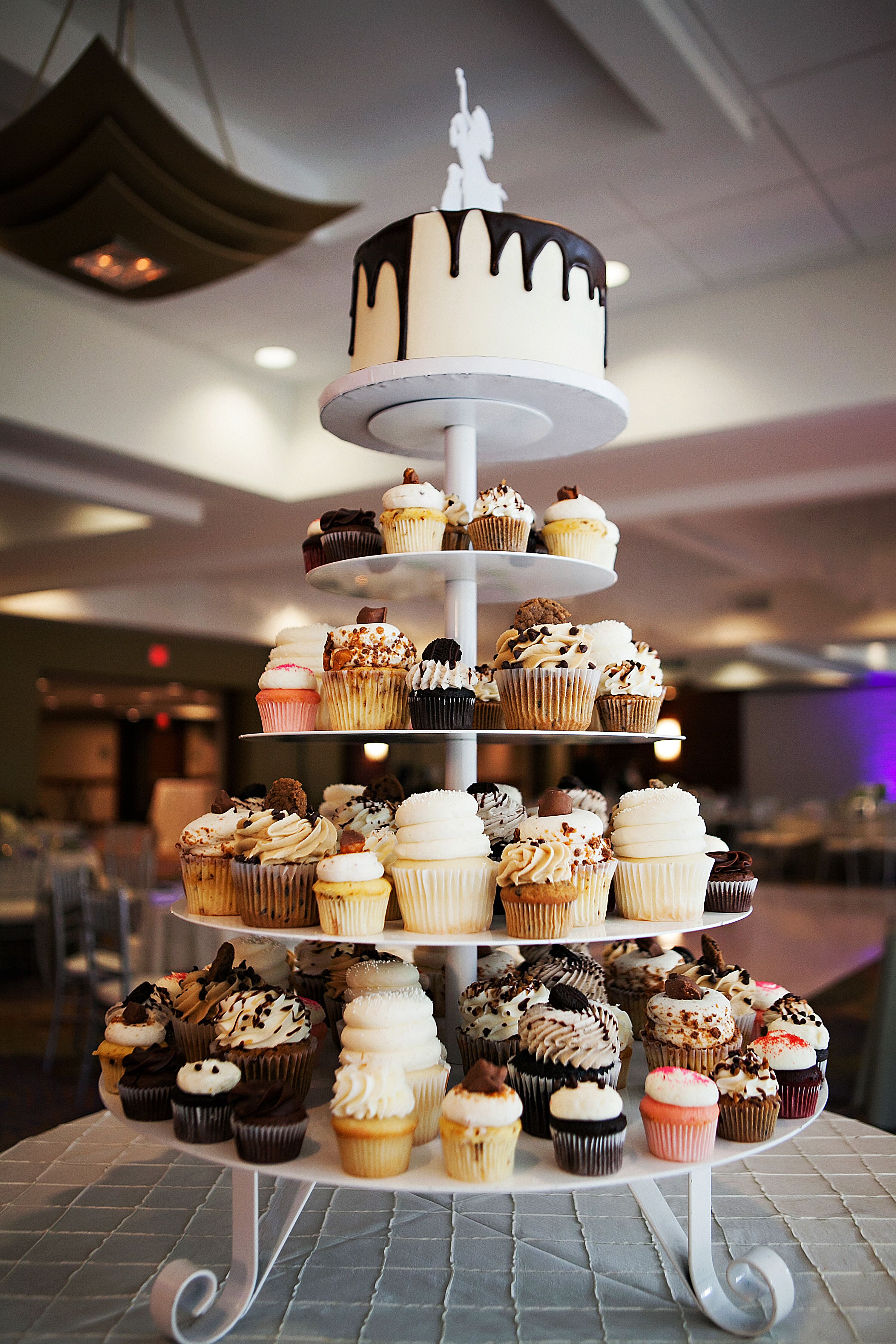 Mismatched Cupcake and Wedding Cake Display