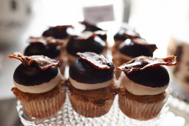 Cupcakes with chocolate icing and bacon
