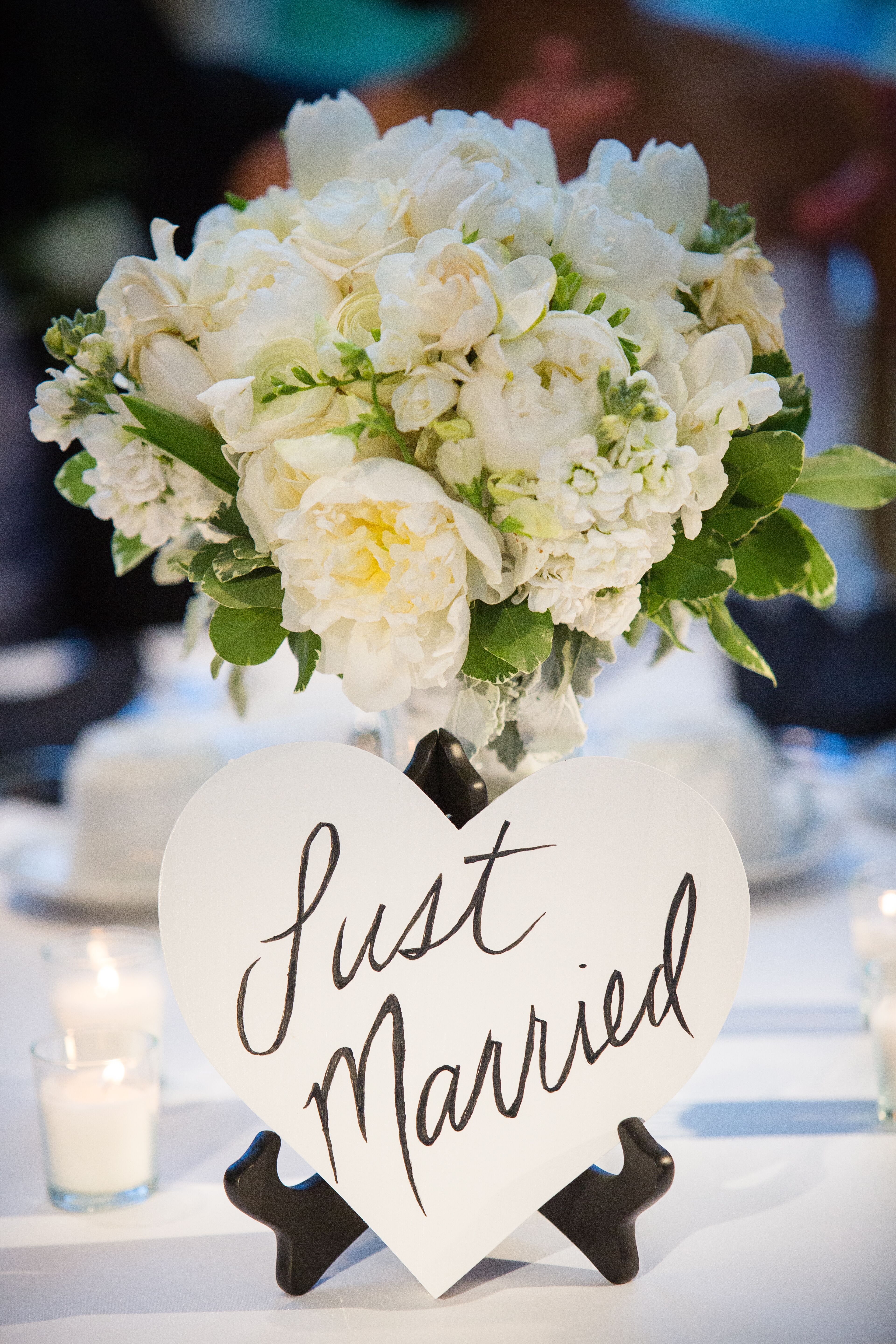 White Flower Arrangements with Heart Shaped Sign