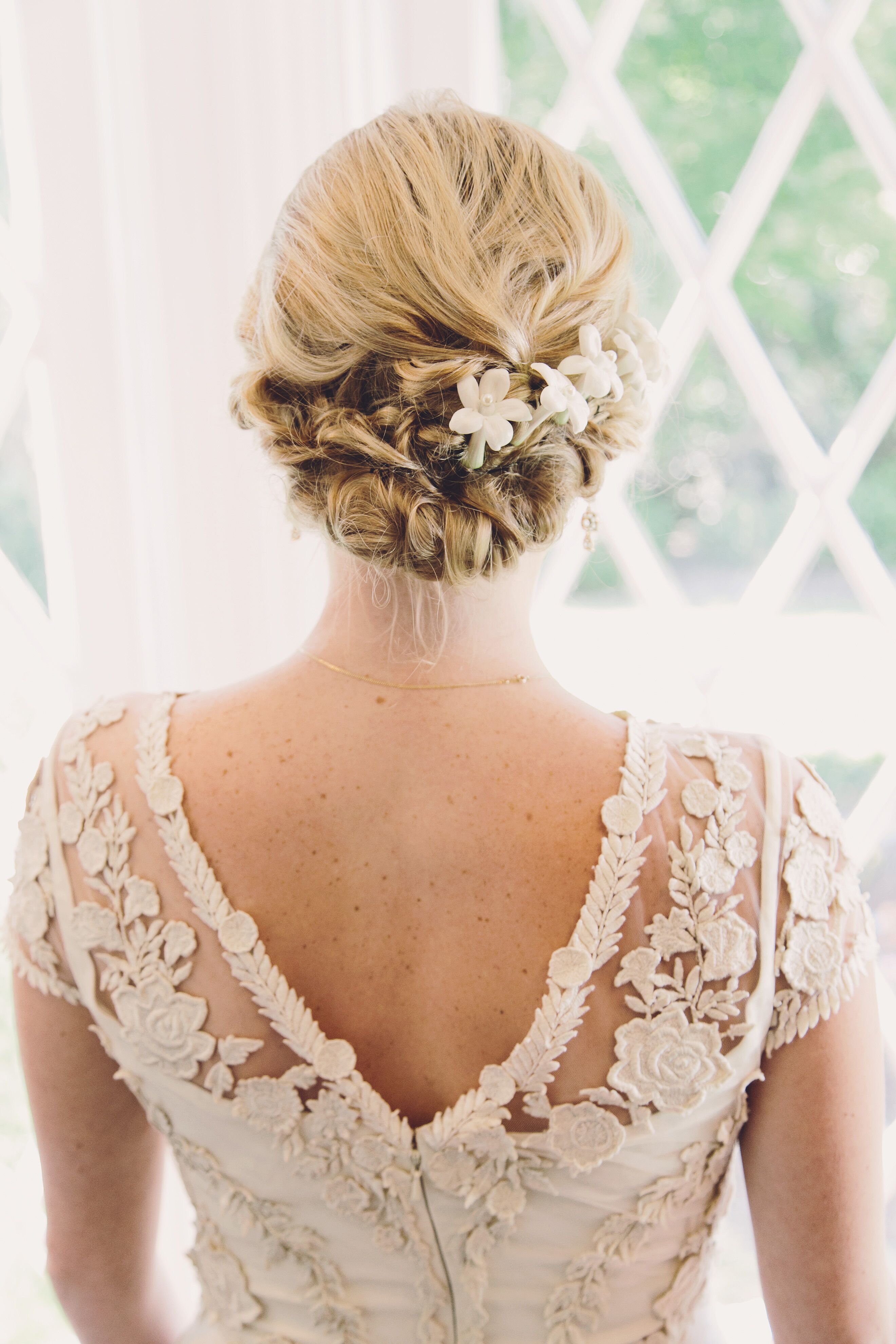 Intricate Updo with Stephanotis Flowers