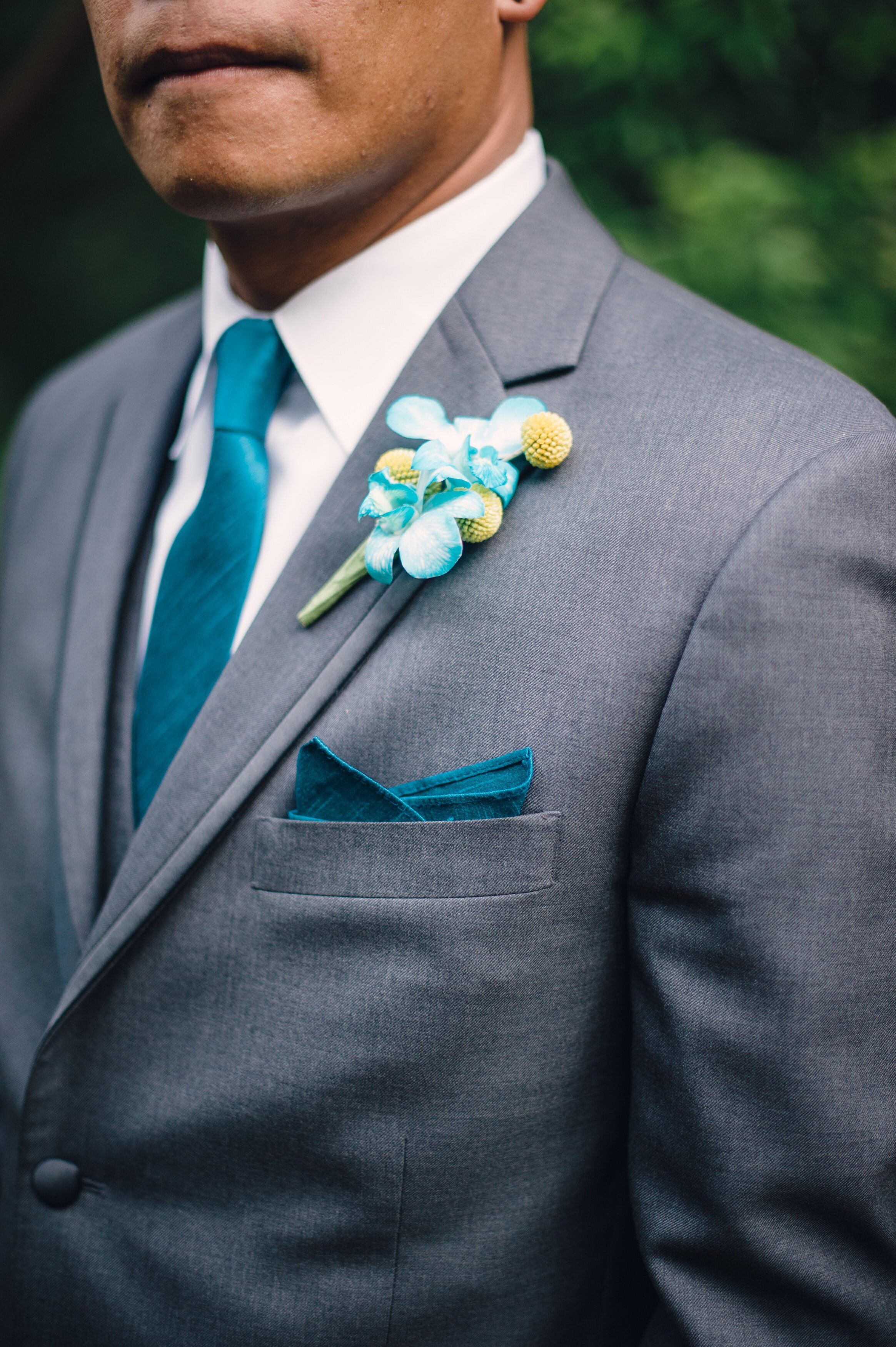 Blue Orchid Boutonniere