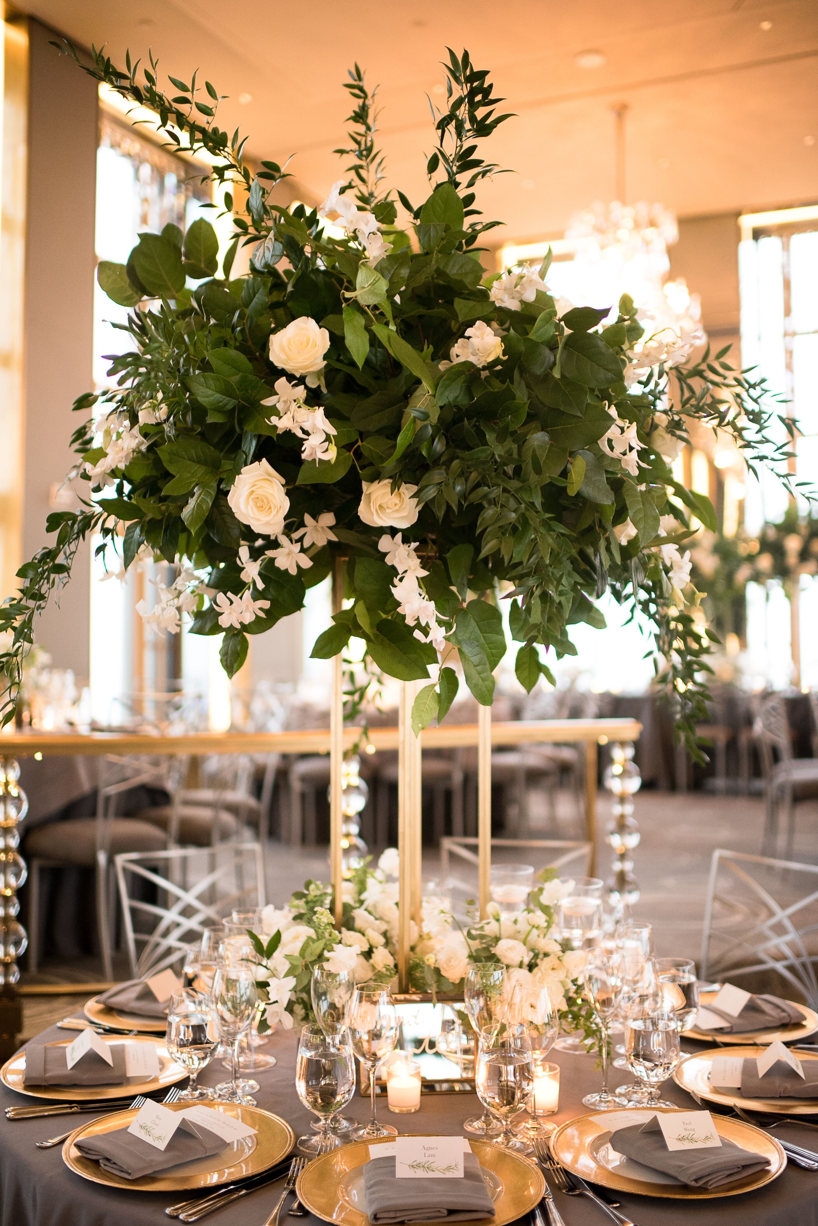 Tall Centerpiece with Roses, Ranunculus and Greenery