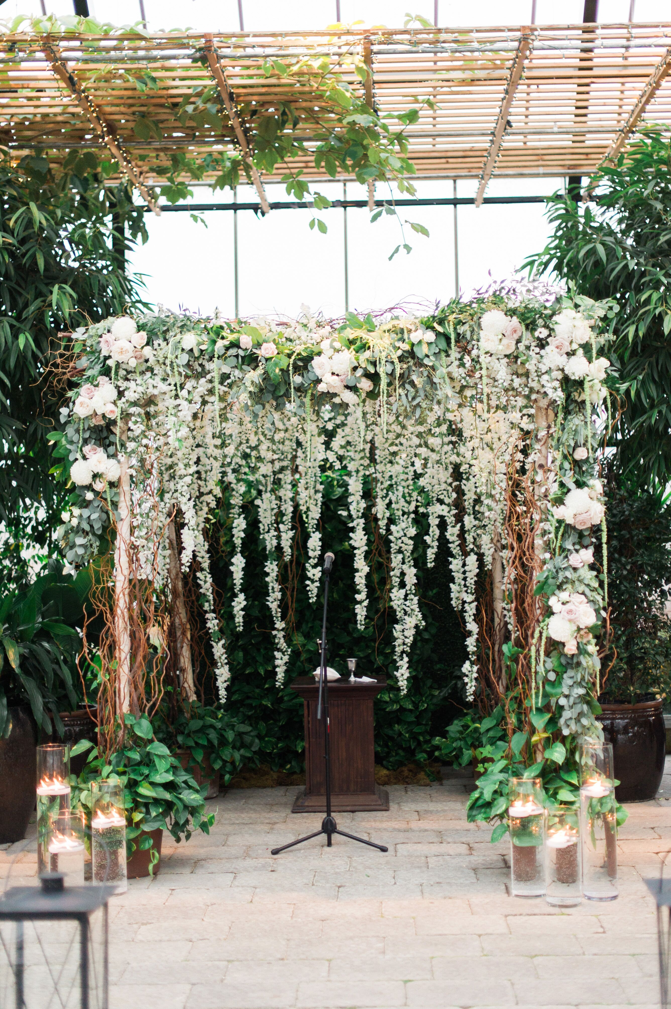 Green and White Floral Wedding Arch