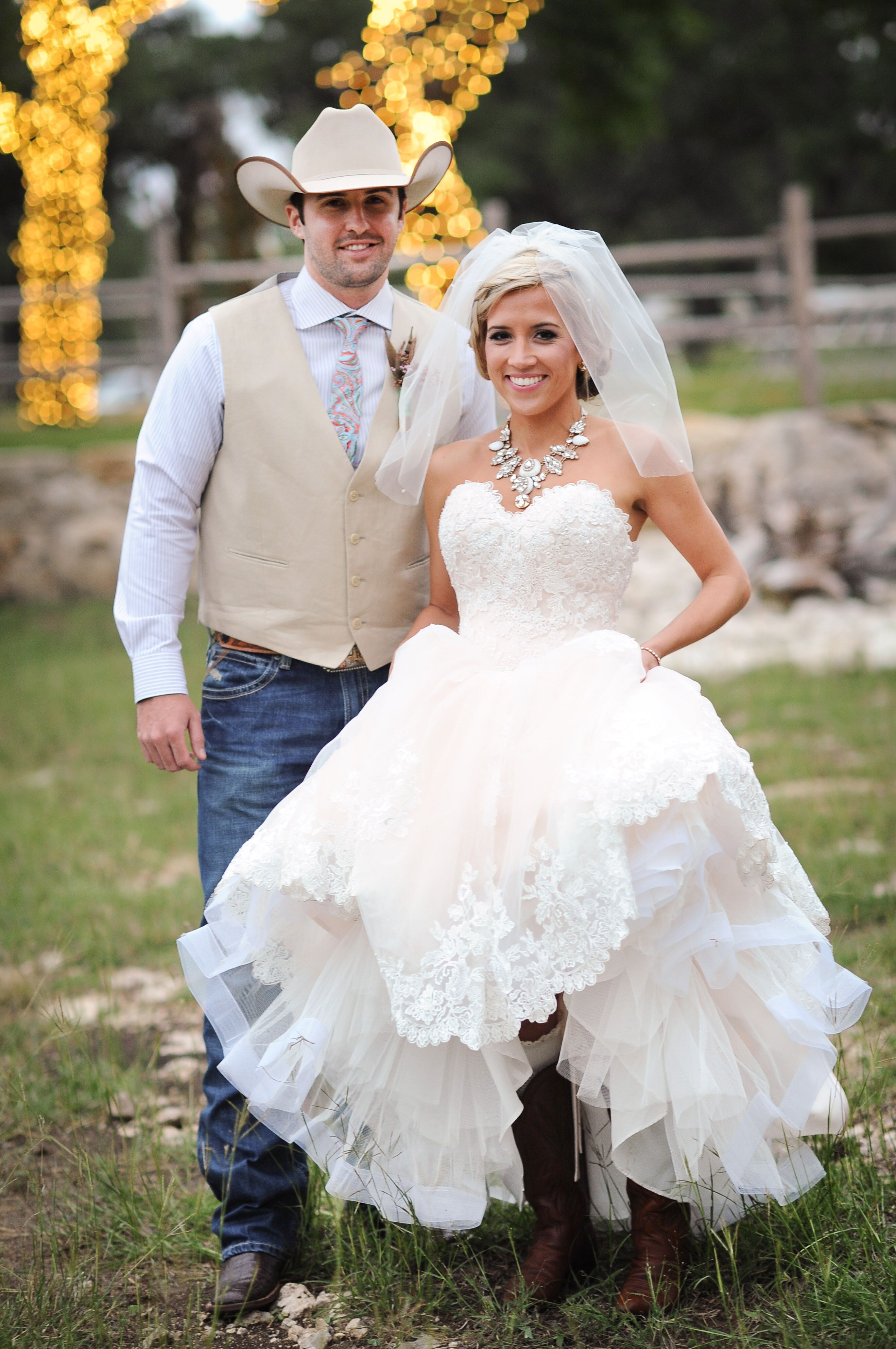 The Bride s Shoulder Length Veil and Wedding Cowboy Boots Under