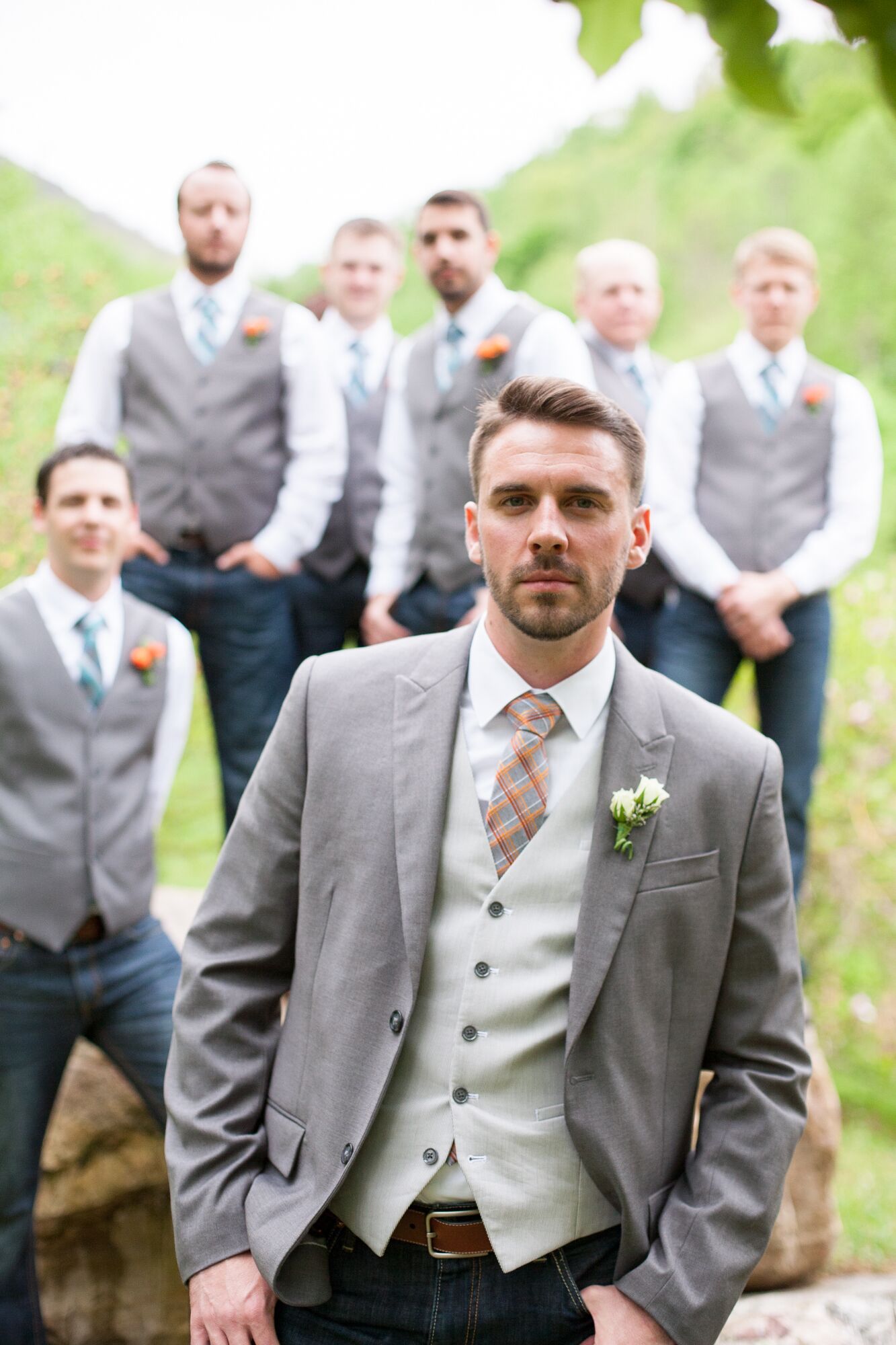 Groom and Groomsmen in Jeans and Gray Vests