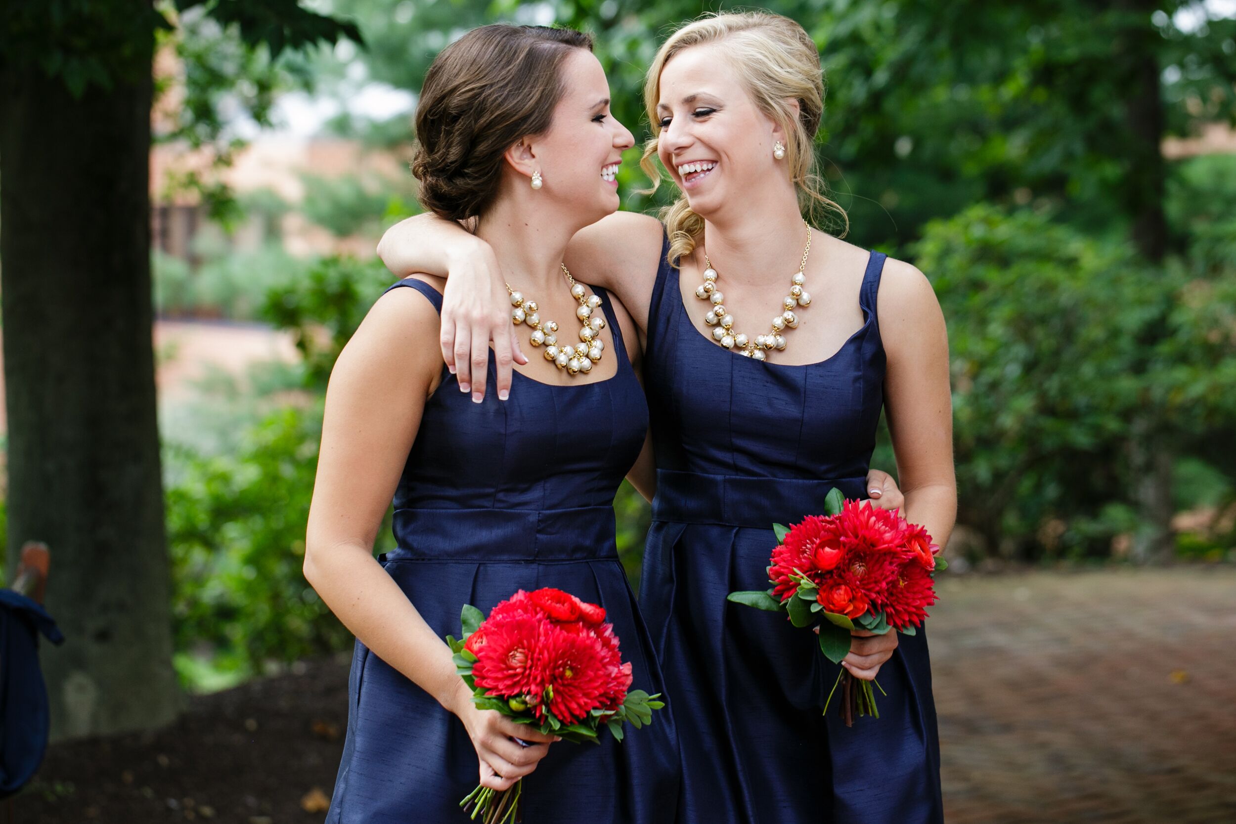 Navy Bridesmaid Dresses and Red Bouquets