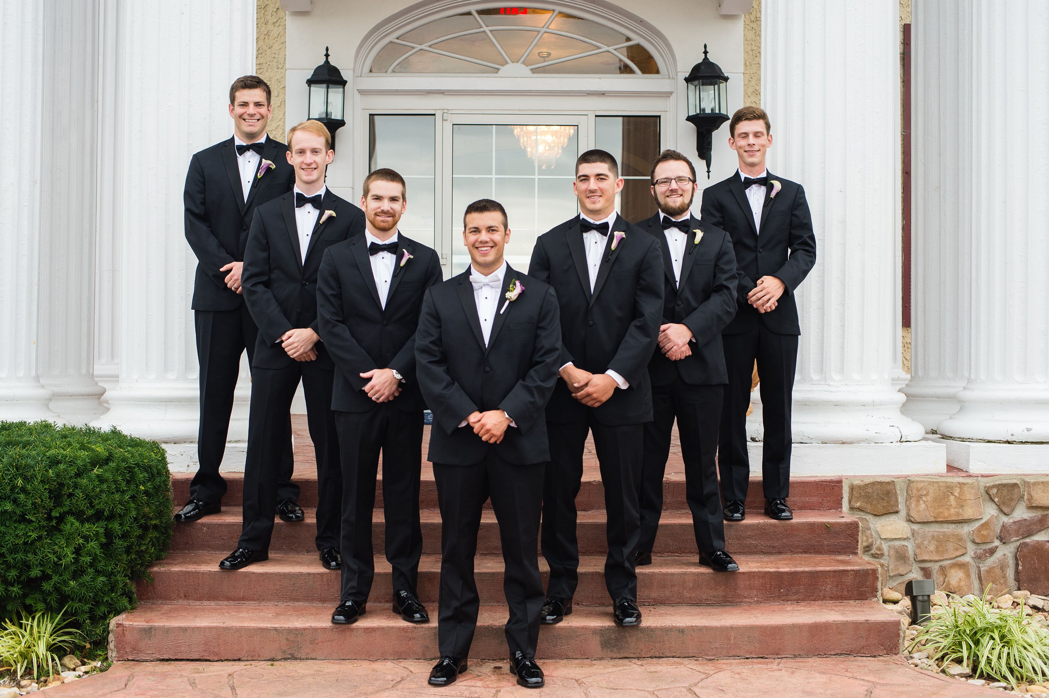 Classic Black Groomsmen Tuxedos and Bow Ties