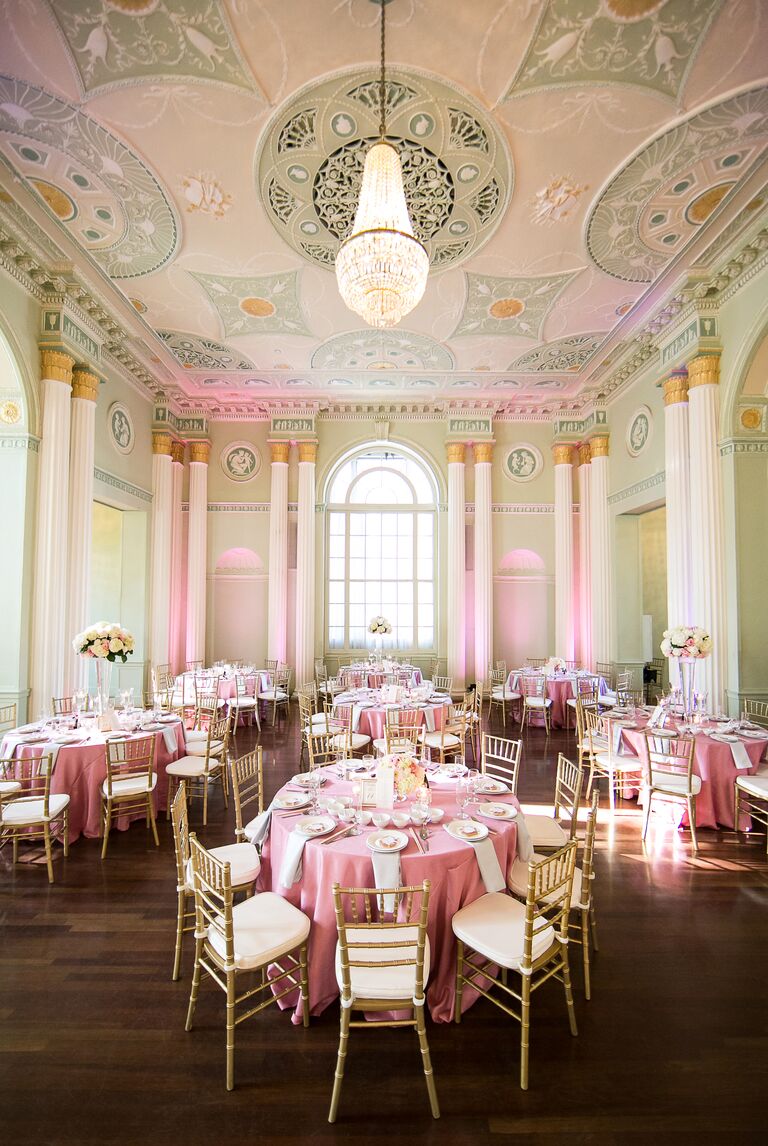 Green and pink wedding reception venue