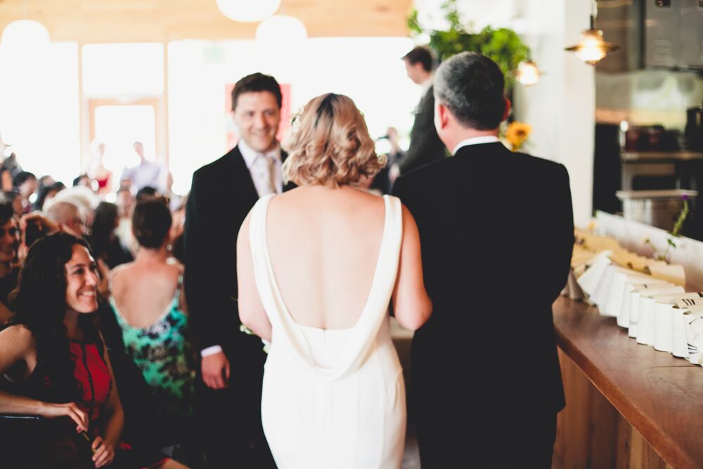 Bride And Her Father Walk Down The Aisle