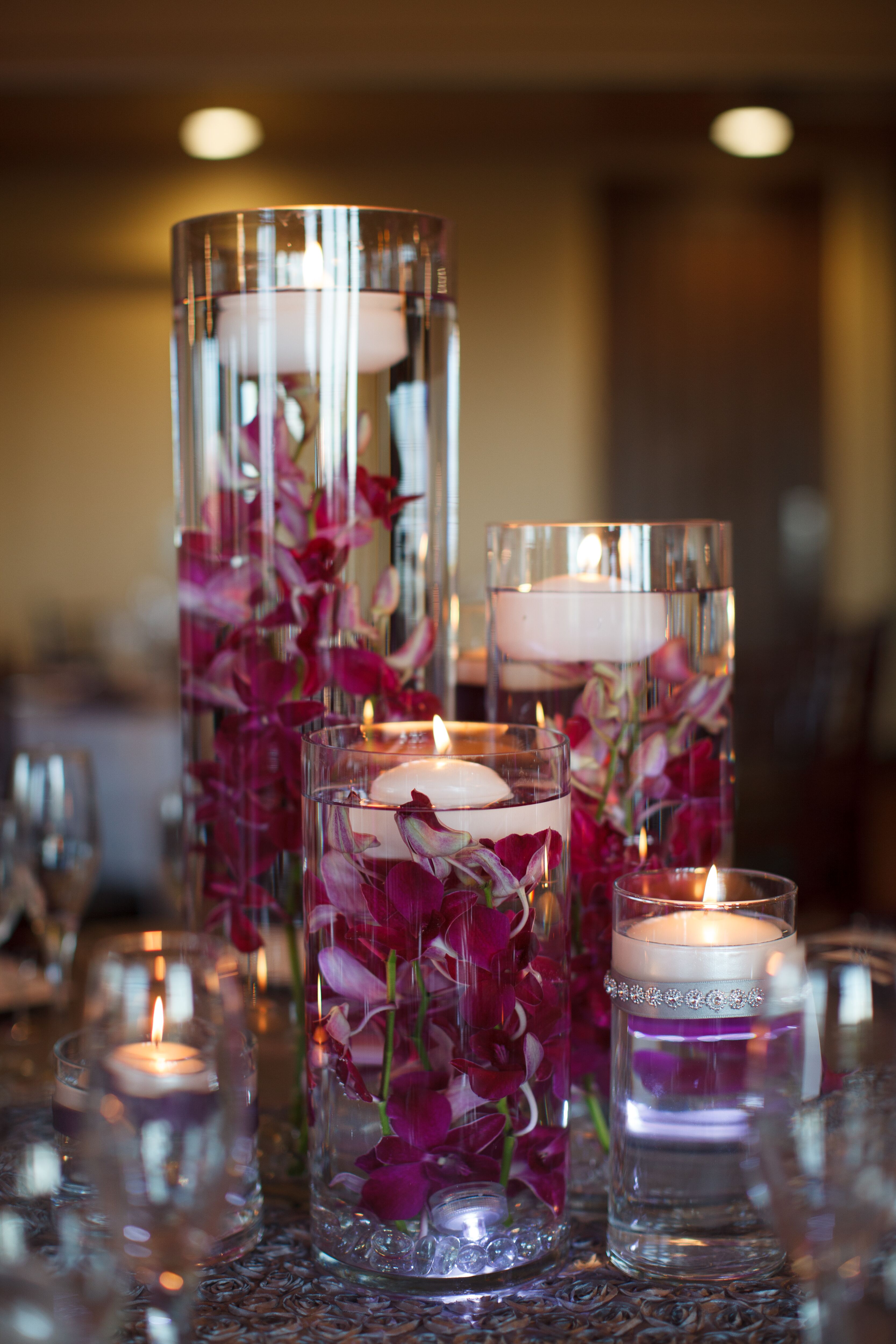 Purple Orchid and Floating Candle Centerpieces