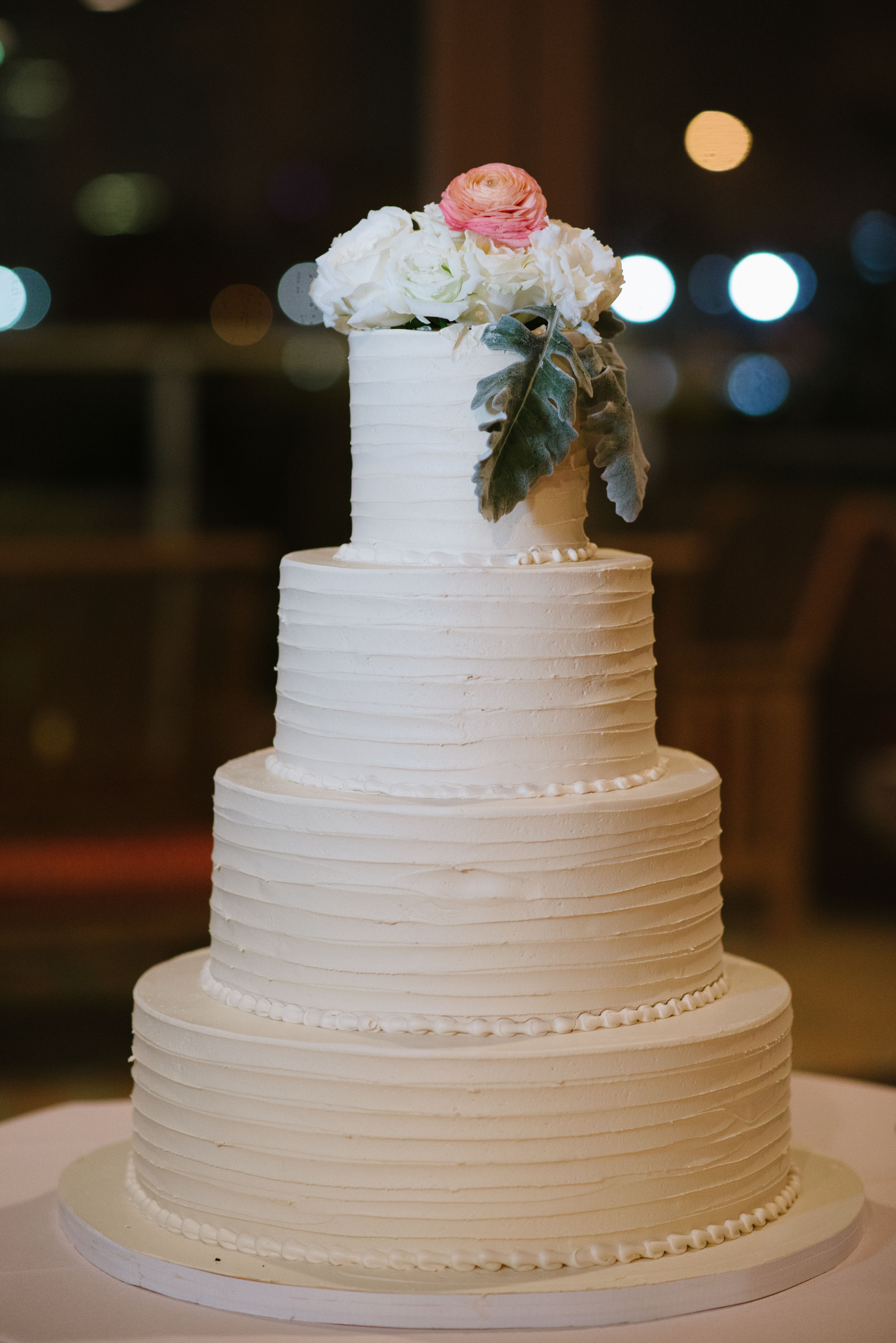 Four-Tier White Buttercream Wedding Cake