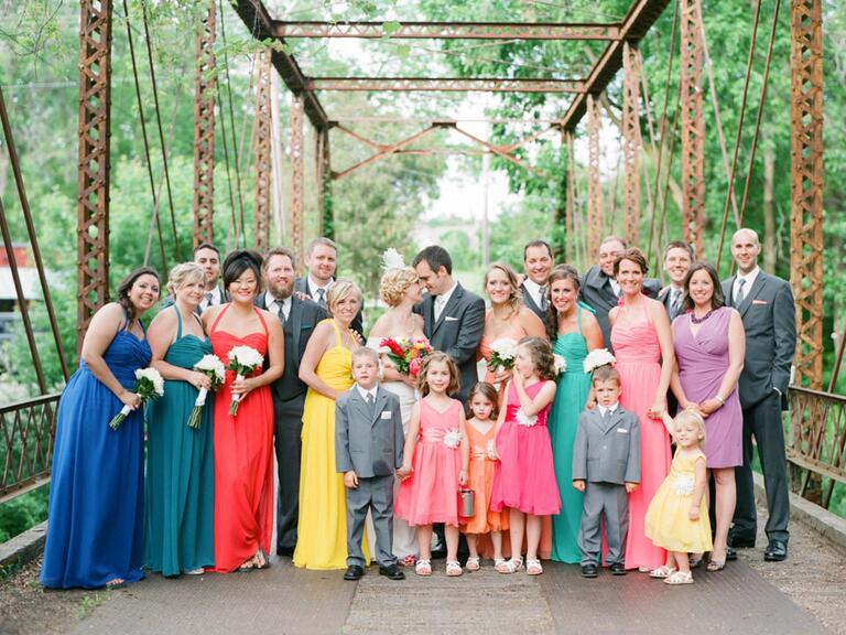 colorful wedding party standing outdoors