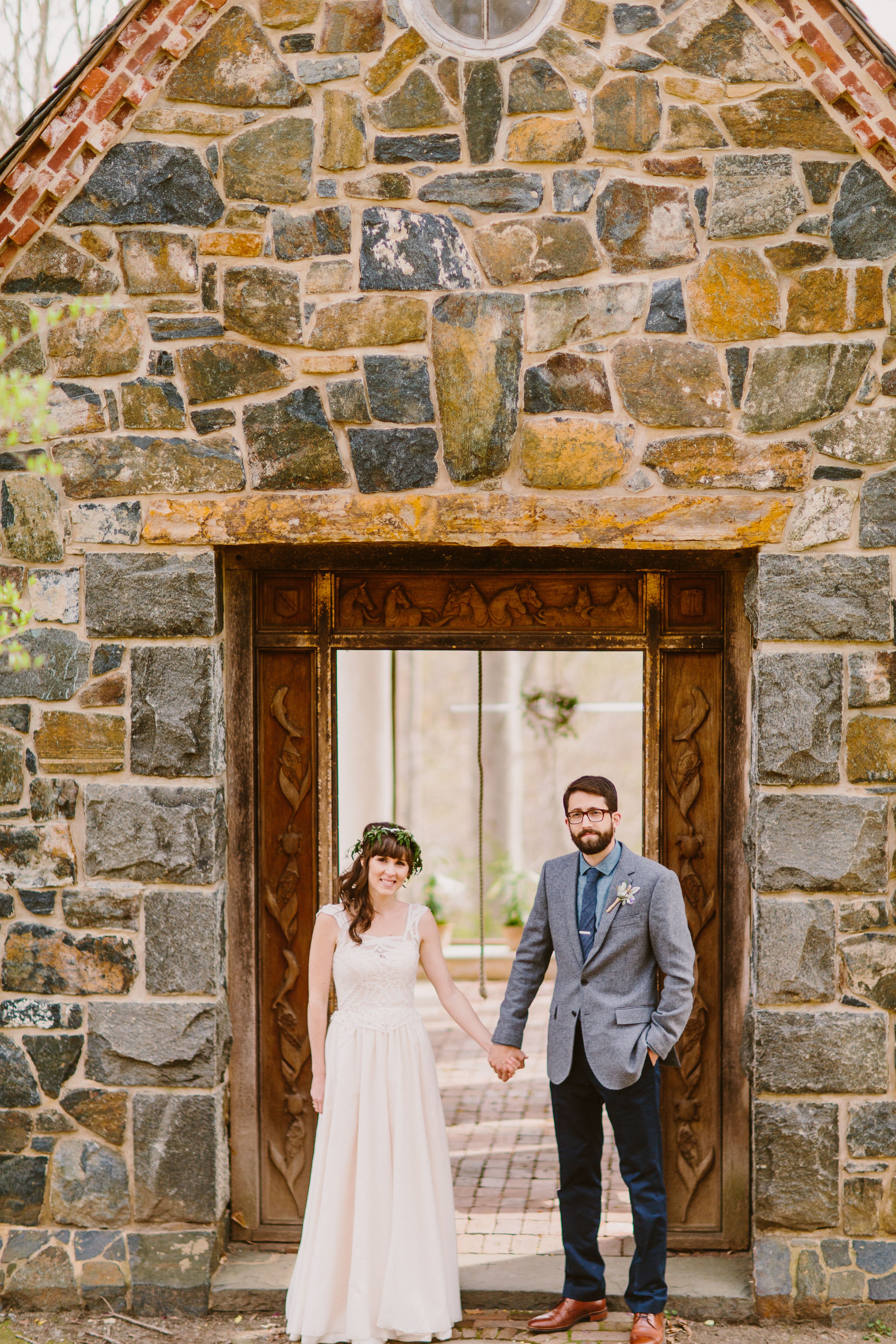 Bride And Groom Standing In Doorway