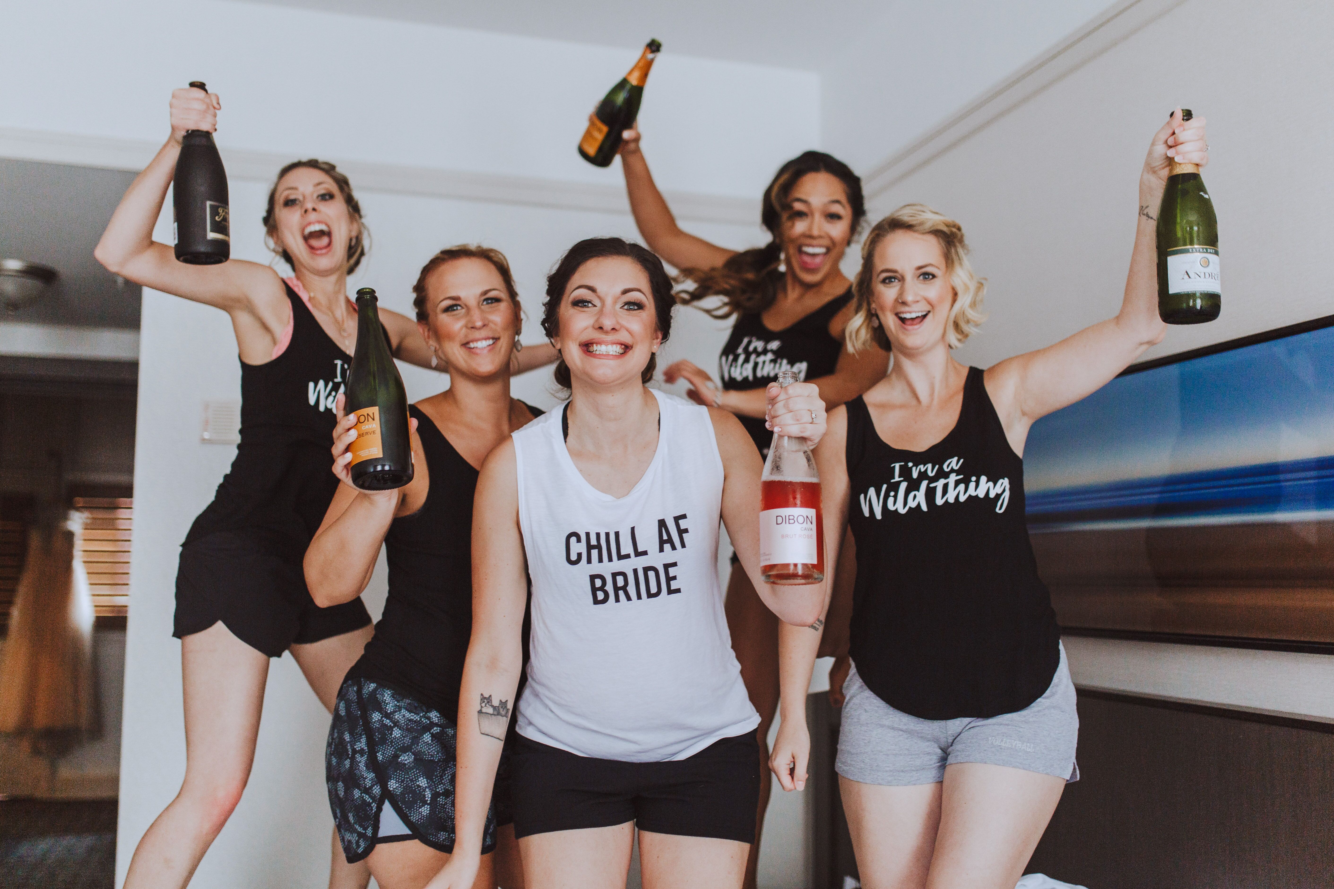 Bride and Bridesmaids in Themed Getting Ready Shirts