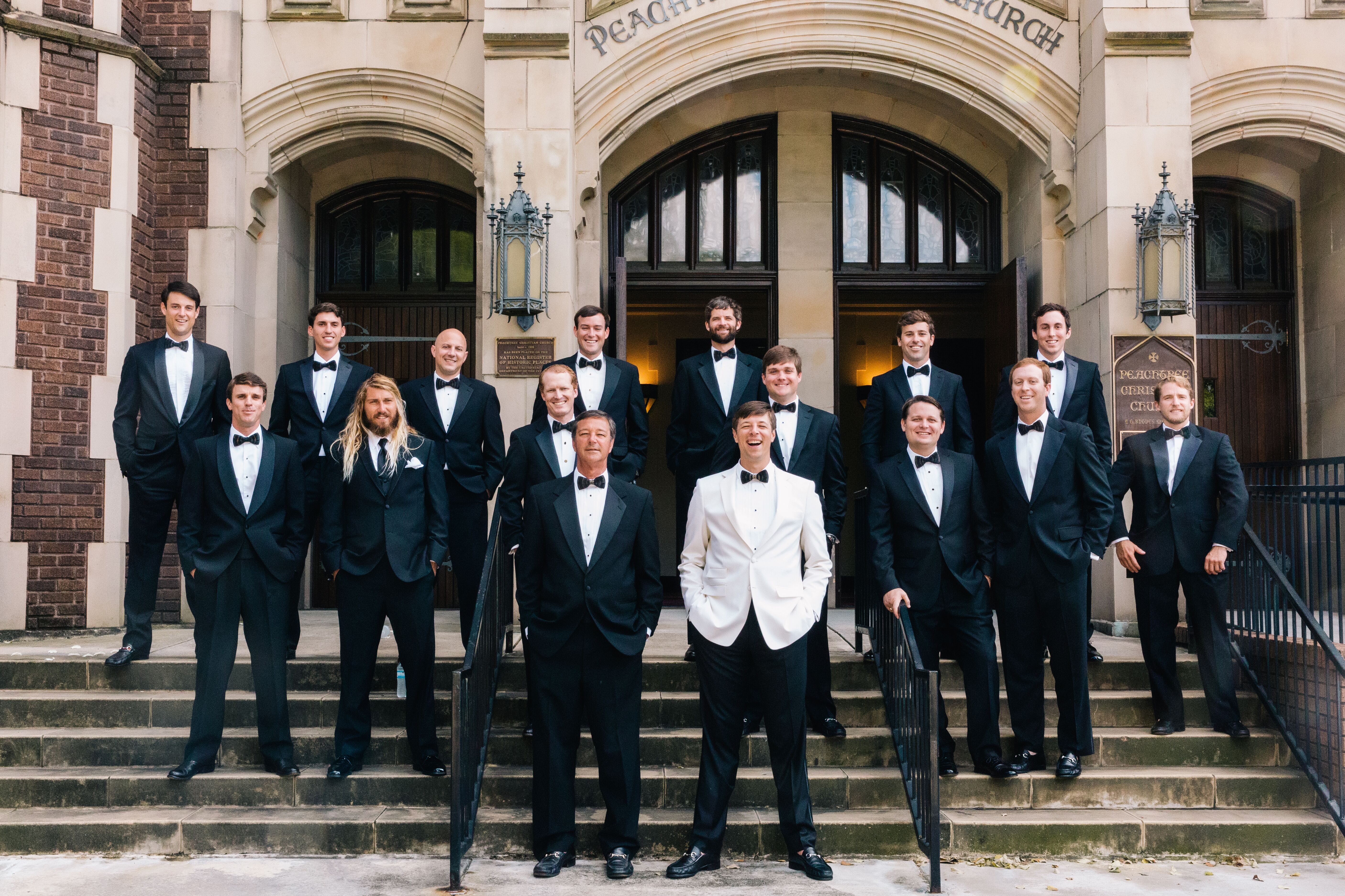 The groomsmen wore black suits with brackish bow ties