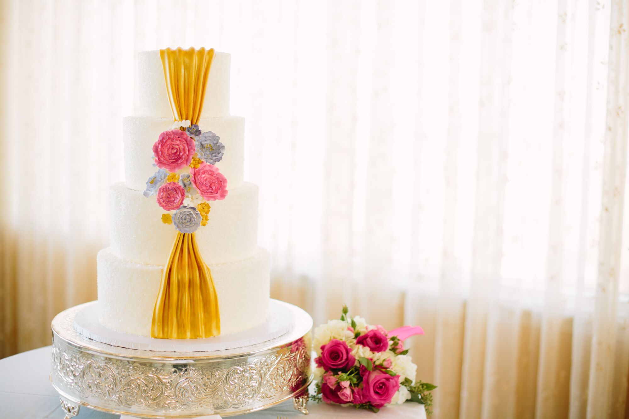 Ornate Gold-and-Pink Fondant Cake