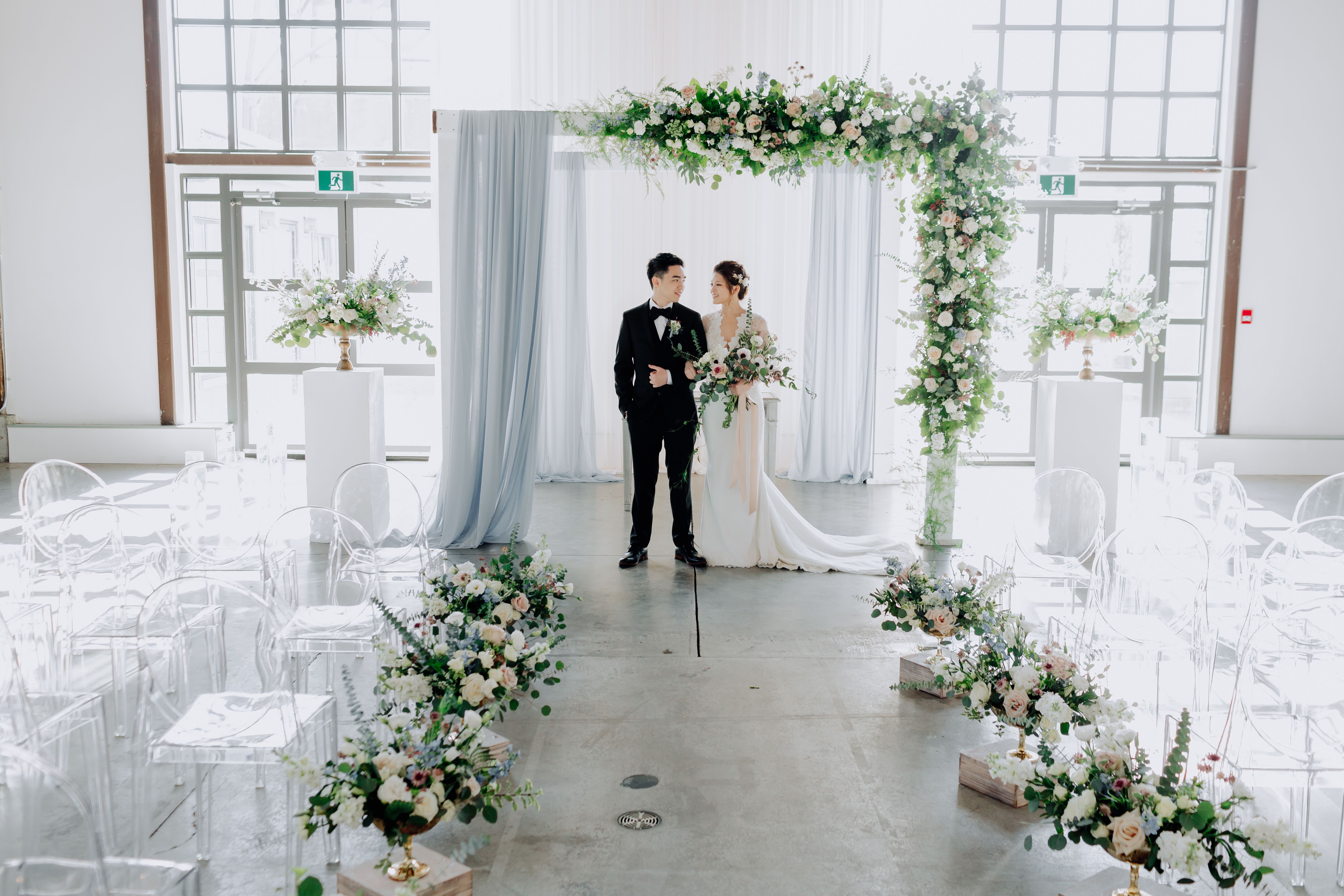 Romantic Fabric-and-Floral-Draped Wedding Arch