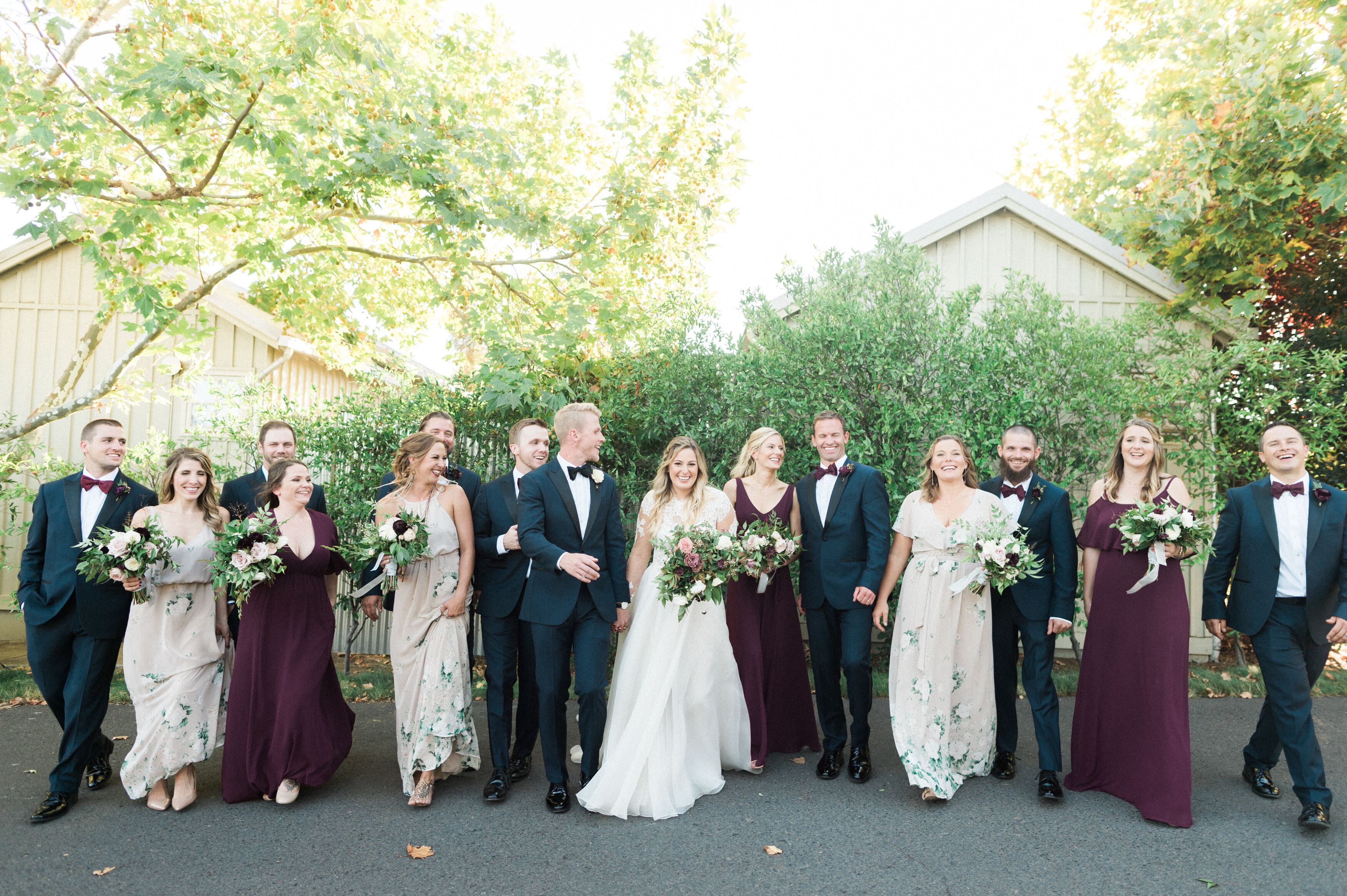 Romantic Wedding Party with Blue Suits and Mismatched Dresses