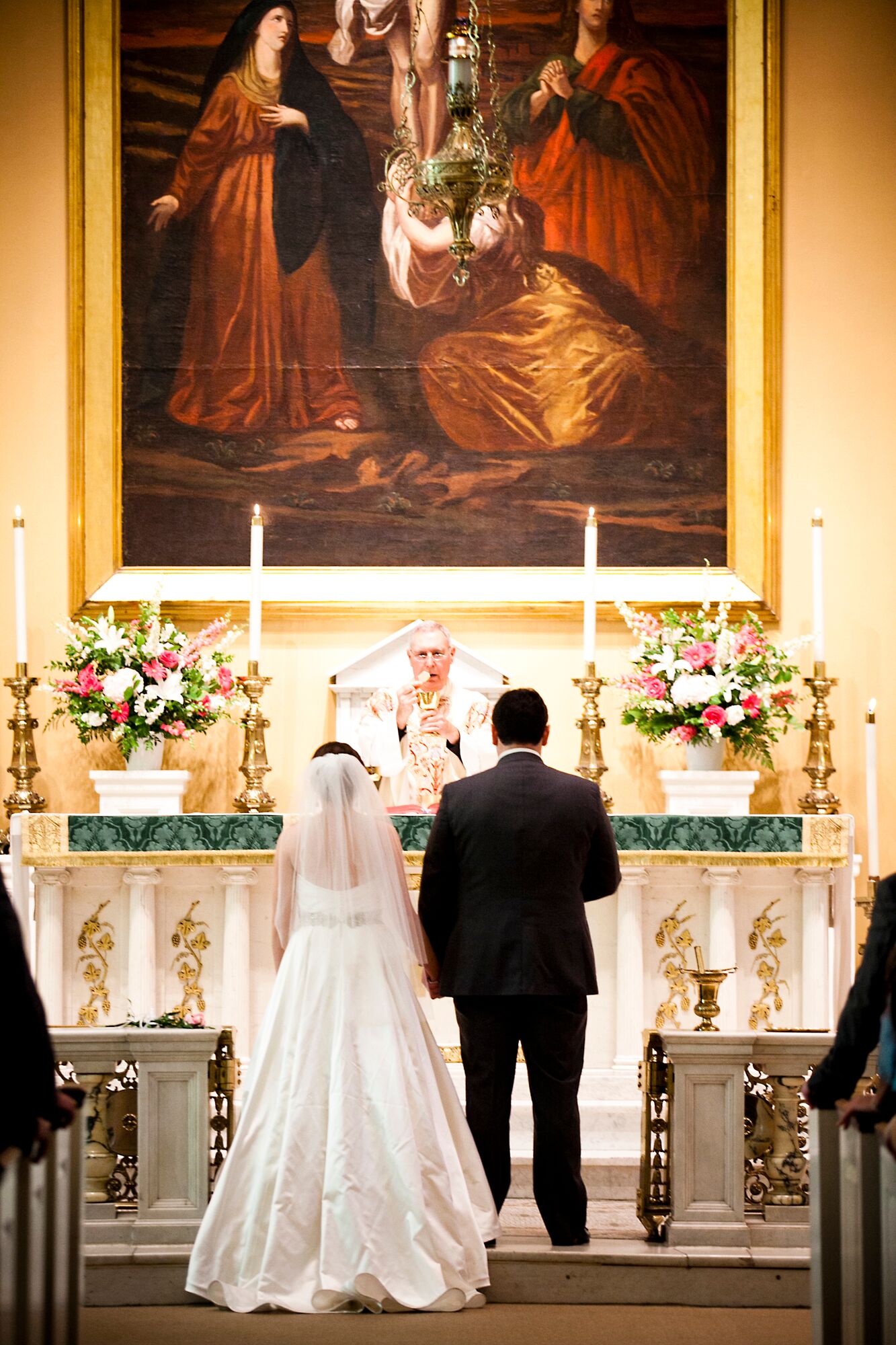 Bride And Groom Facing Ceremonial Altar