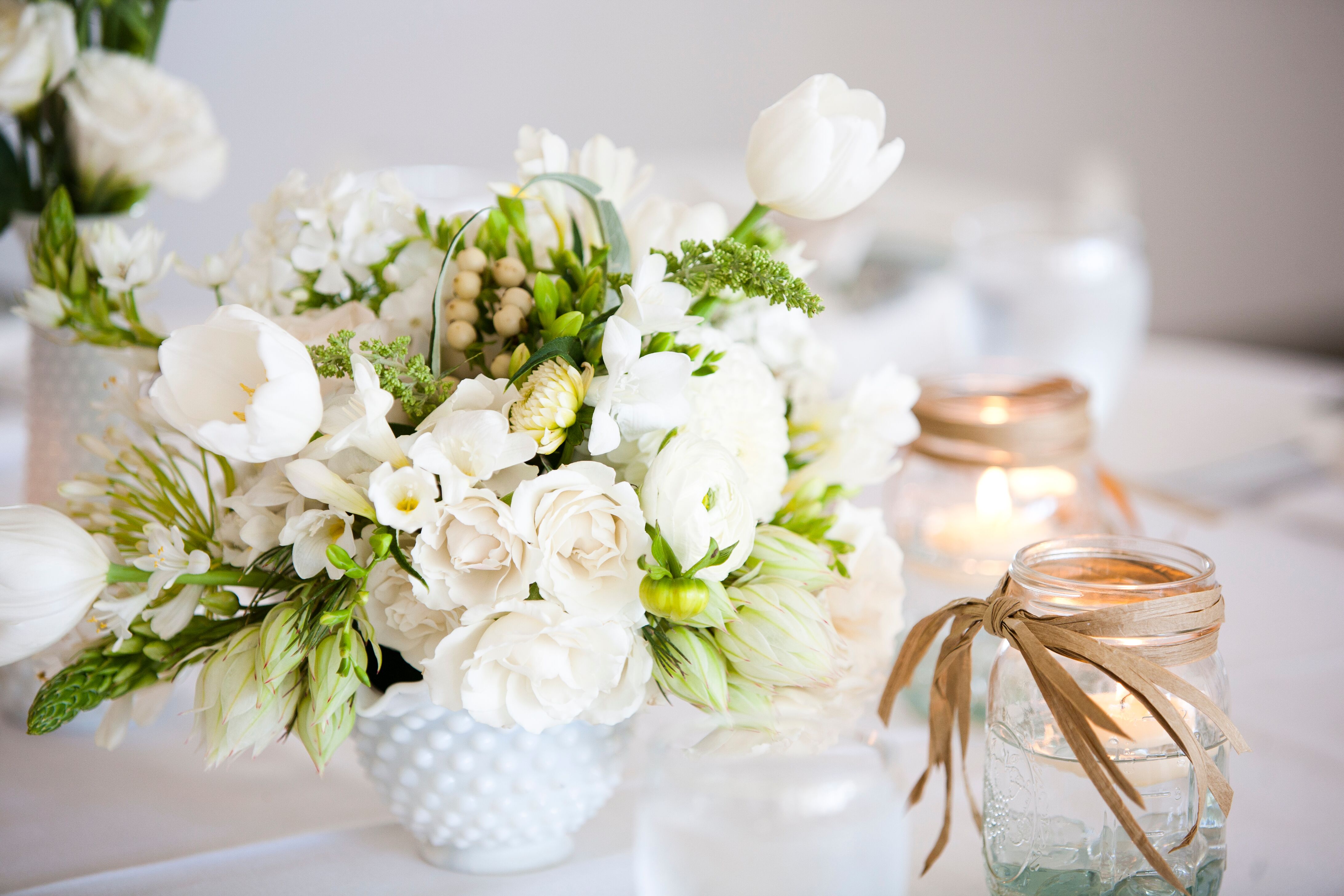 Elegant Ivory Centerpiece with Floating Votives