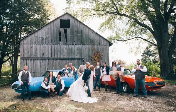 Dark Jean and Vest Groomsmen Attire