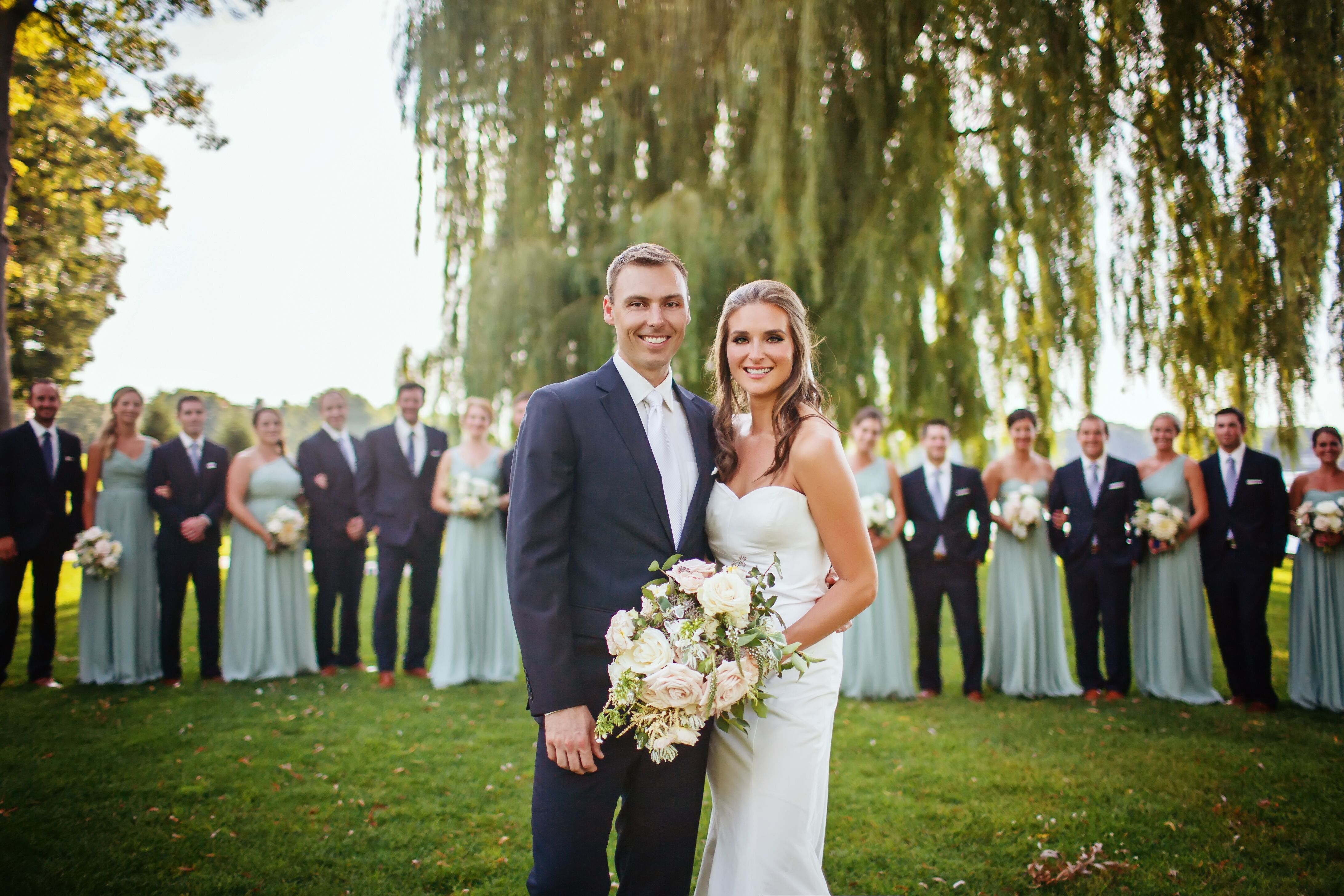 green dress navy suit