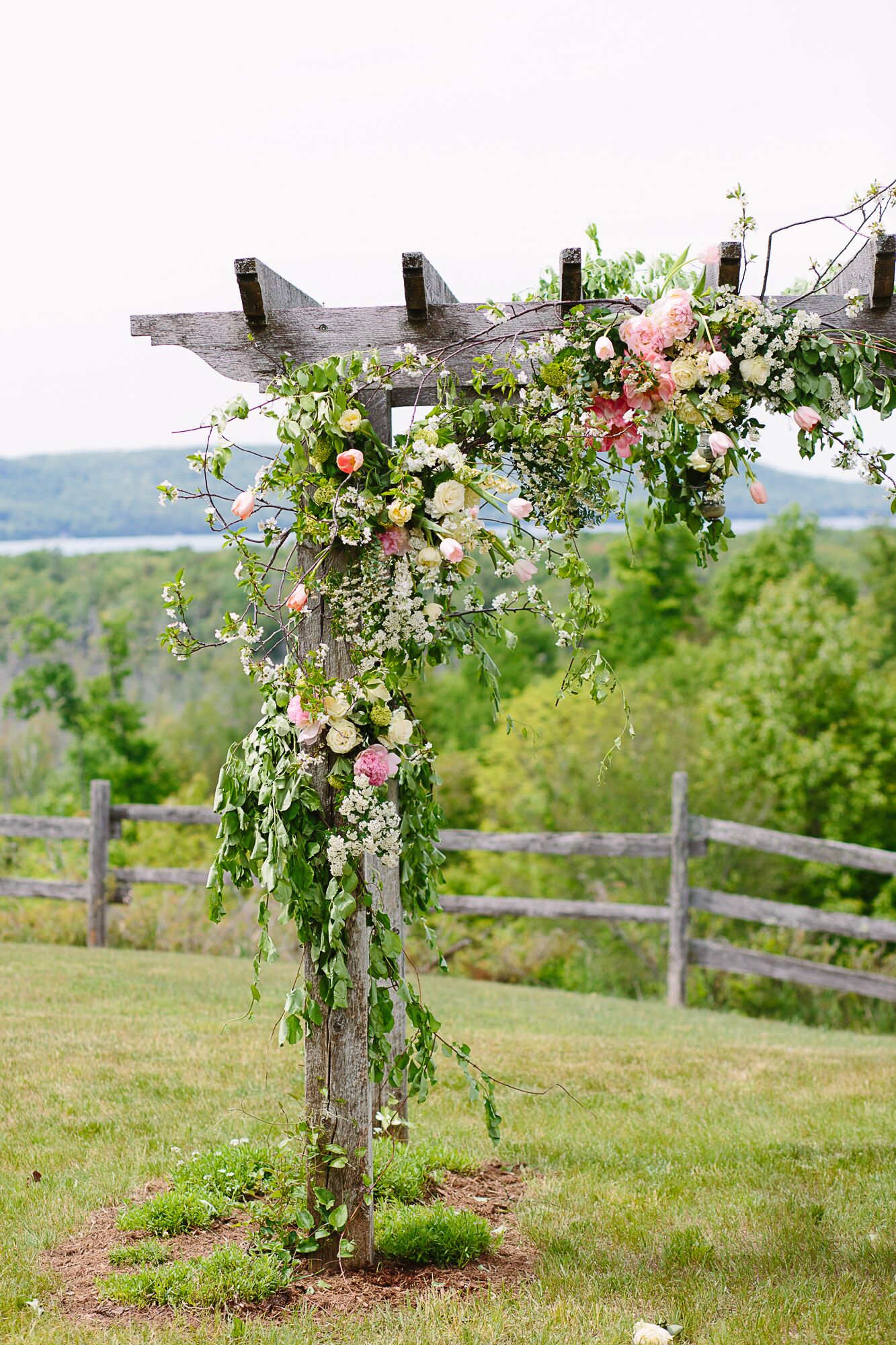 Wood Wedding Arch with Cascading Flowers