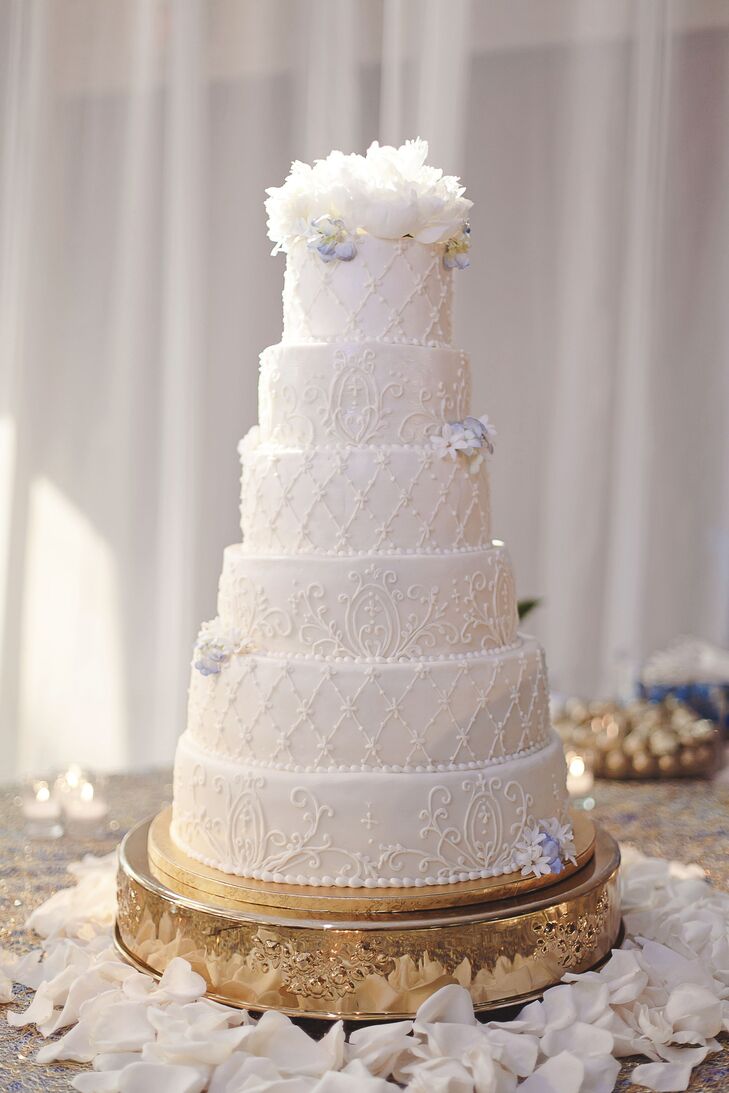 White Six Tier Wedding Cake With Piping 