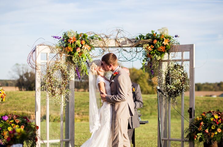 Flower-Covered White Door Wedding Arbor