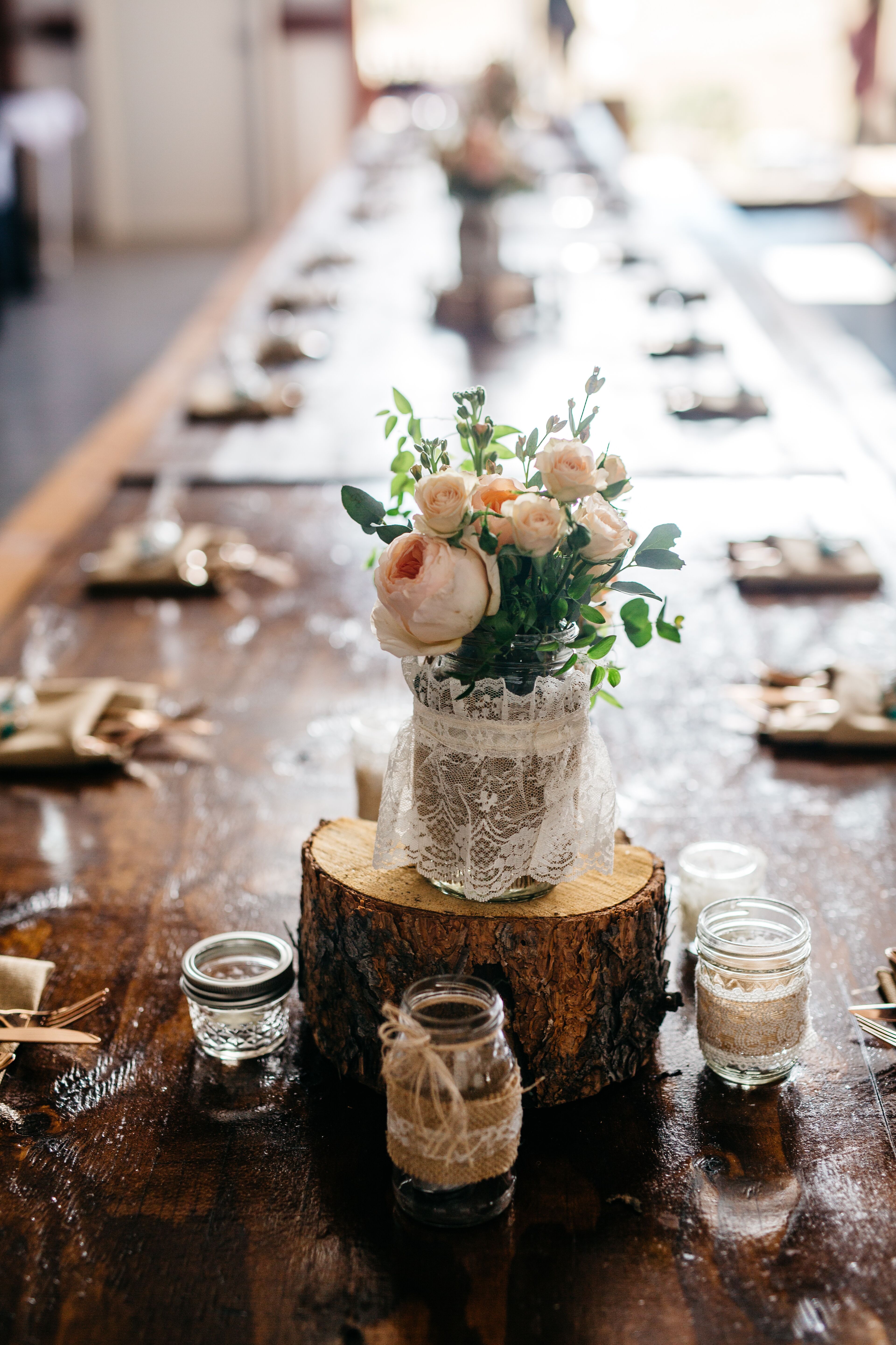 Tree Stump Centerpieces With Mason Jars