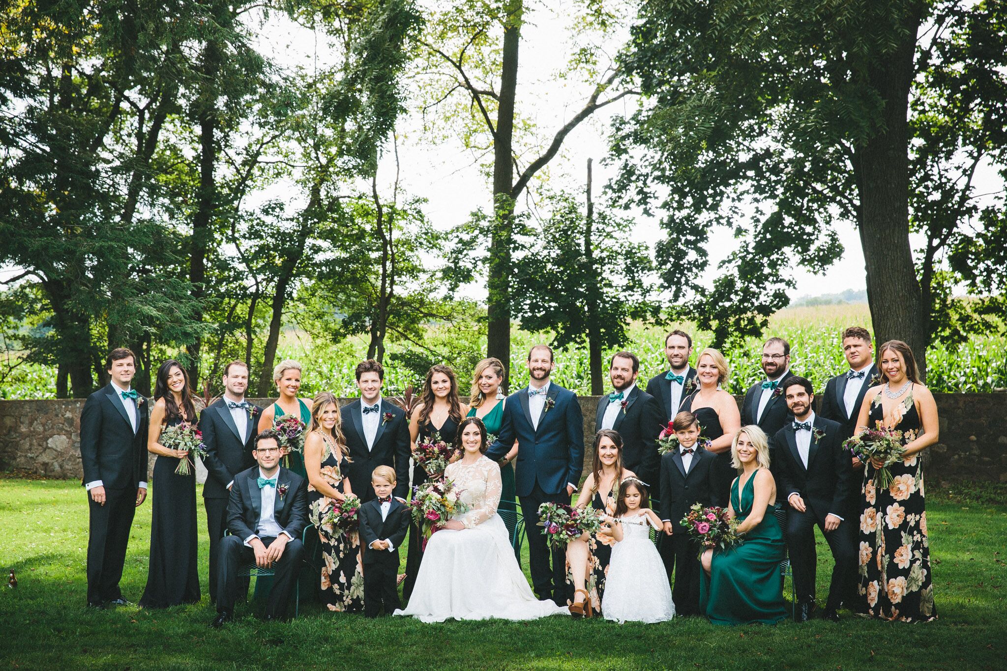 Classic Black Tuxedos and Mismatched Reformation Bridesmaid Dresses