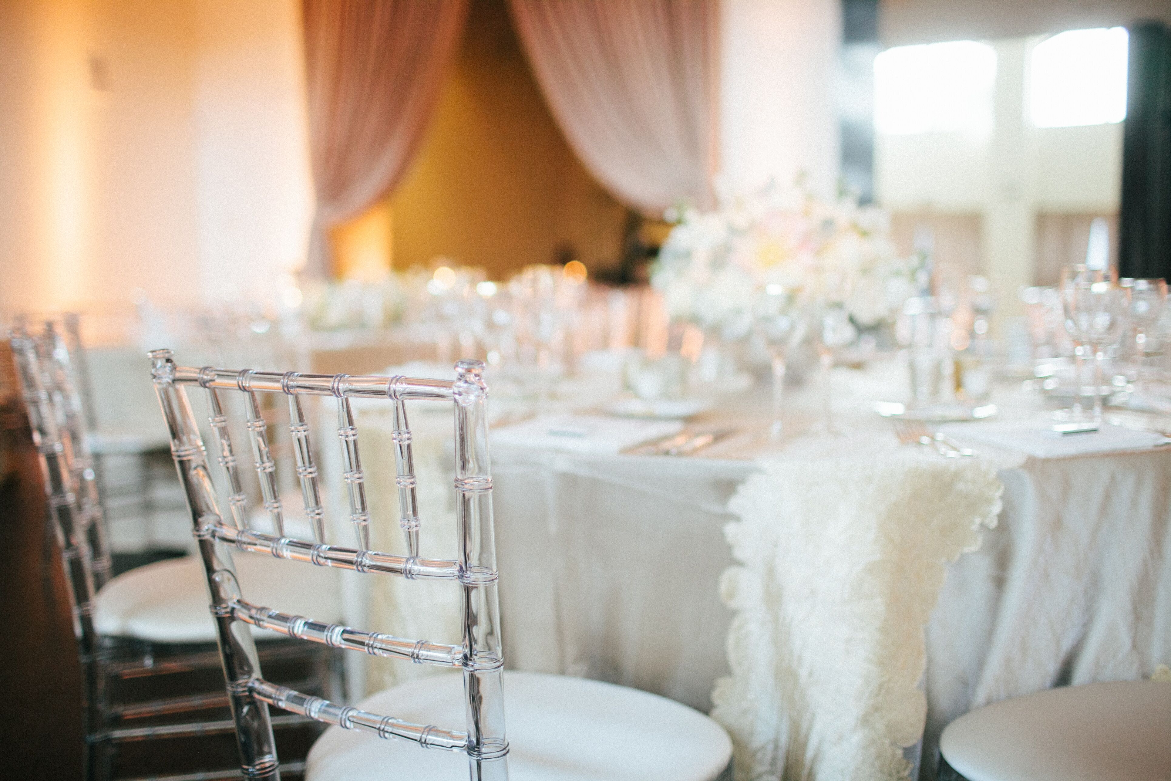 Clear Chiavari Chairs with White Linens