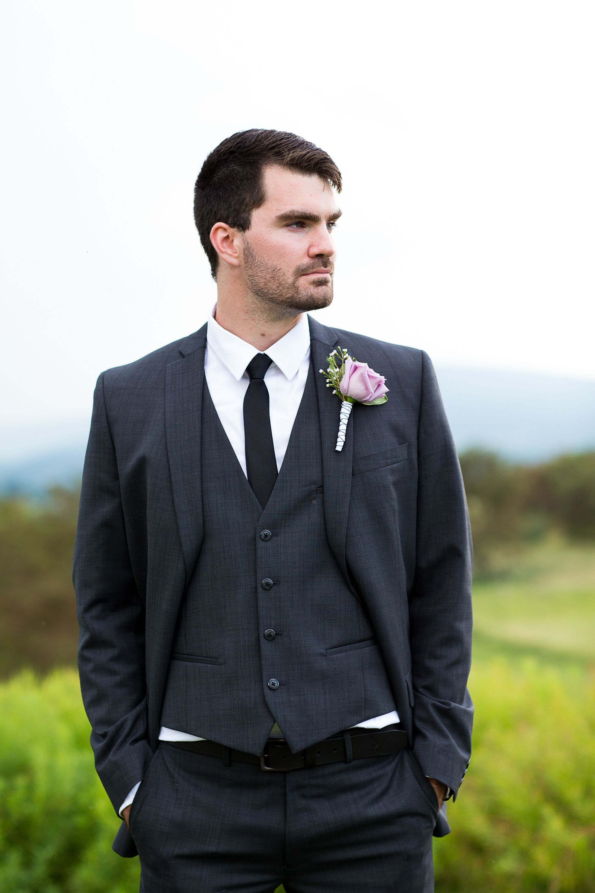 Groom in a Charcoal Gray Suit at Musket Ridge