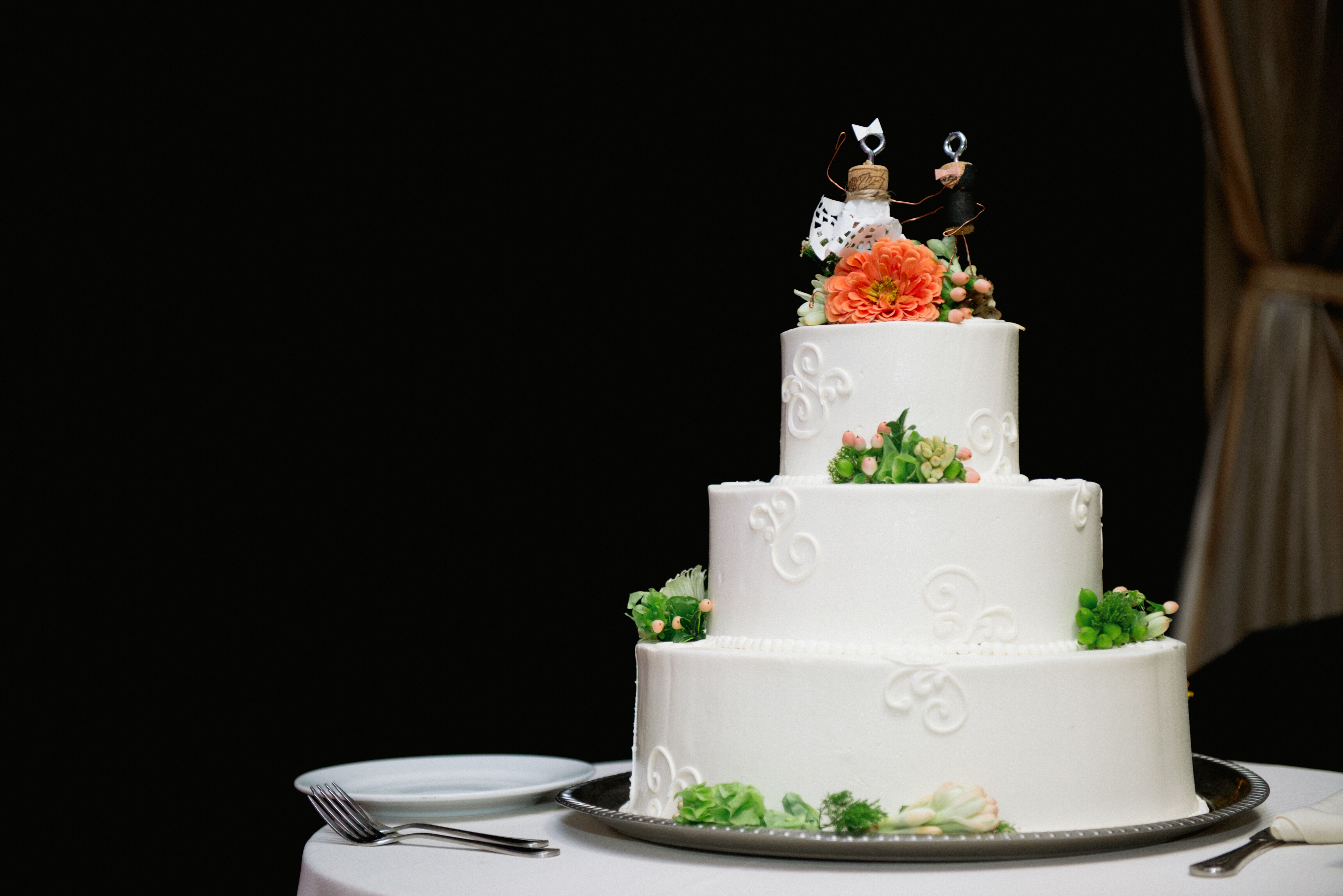 White Wedding Cake With Peach Zinnia And Hypercium Berries