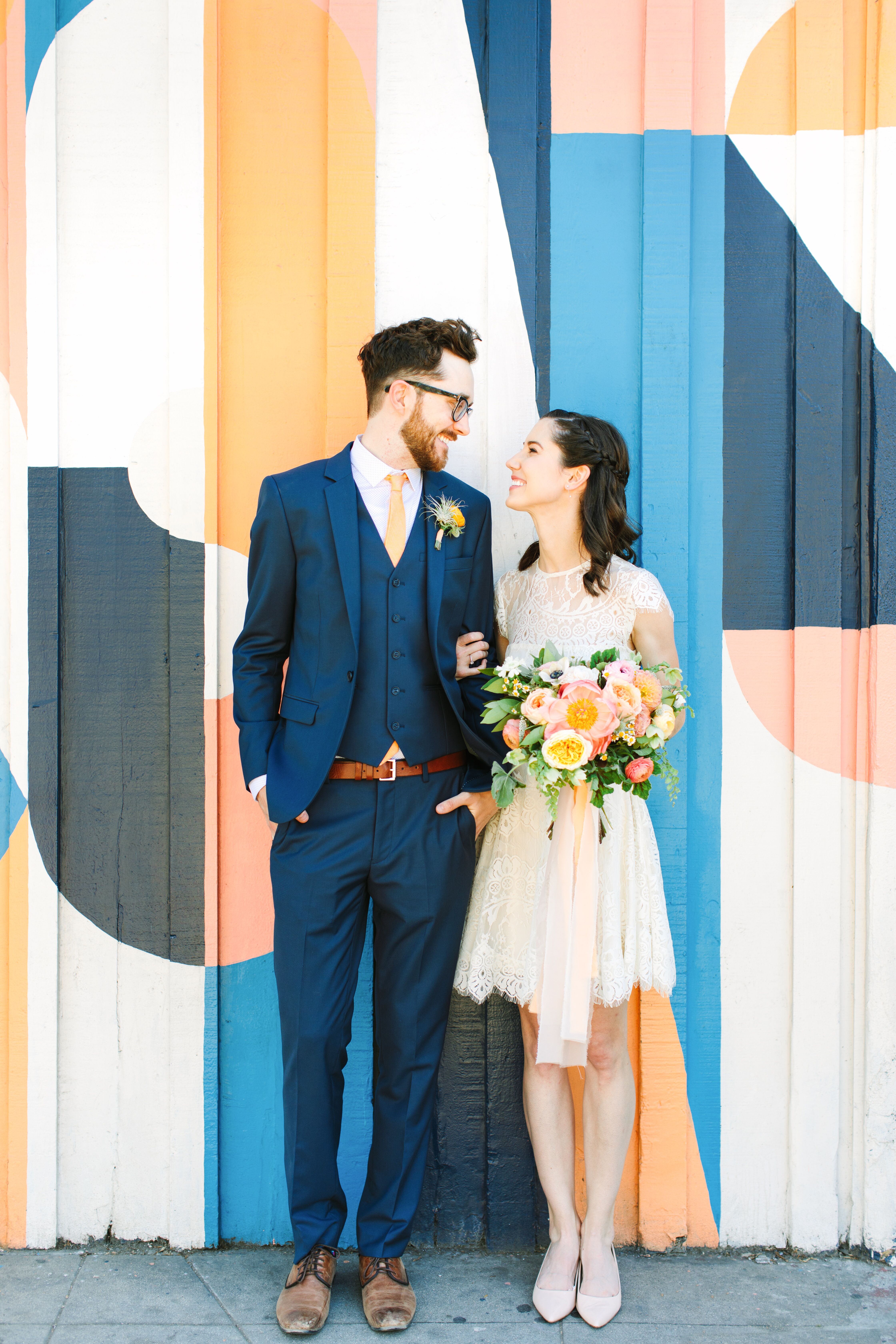 red dress and navy blue suit