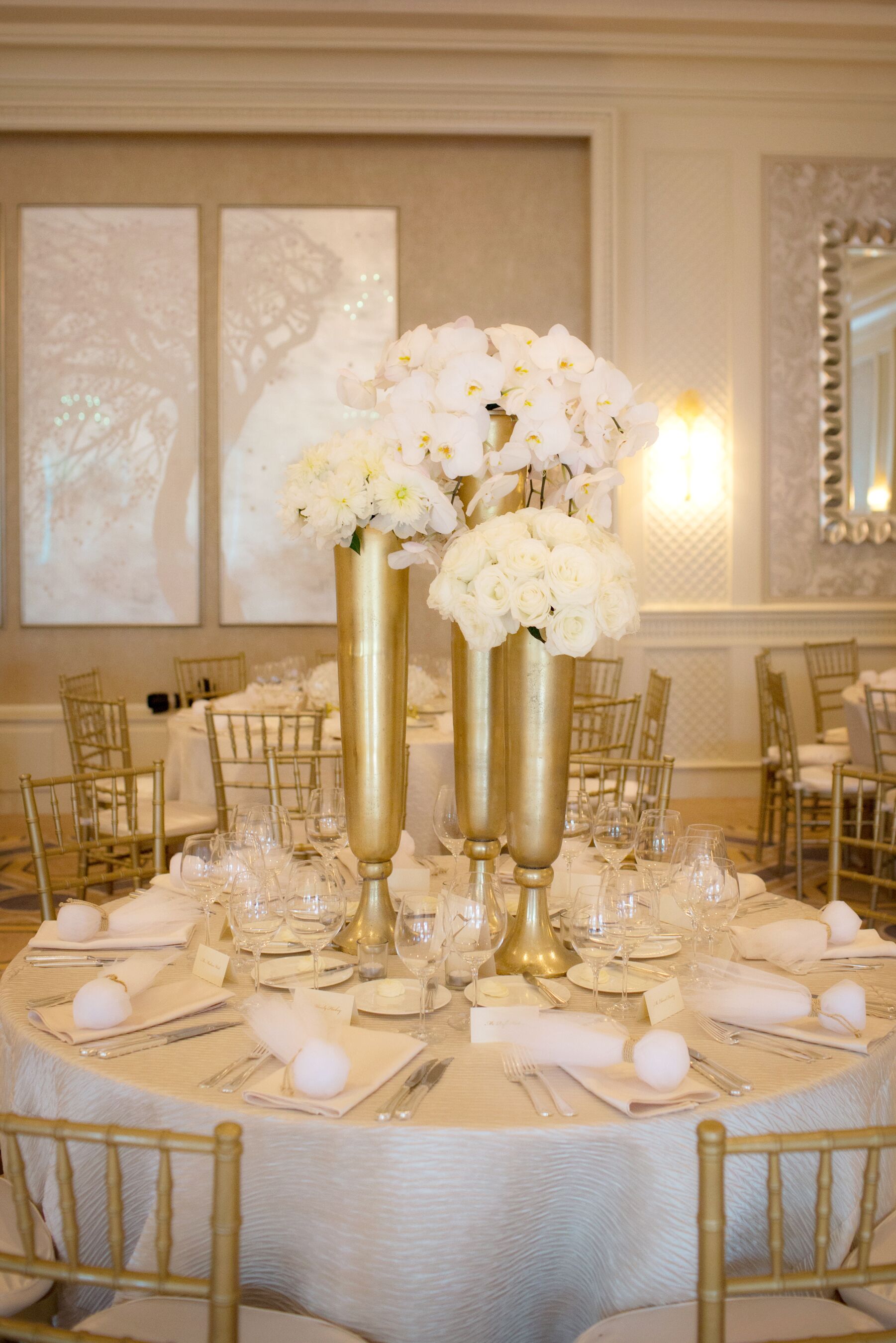 White Flowers In Gold Vase