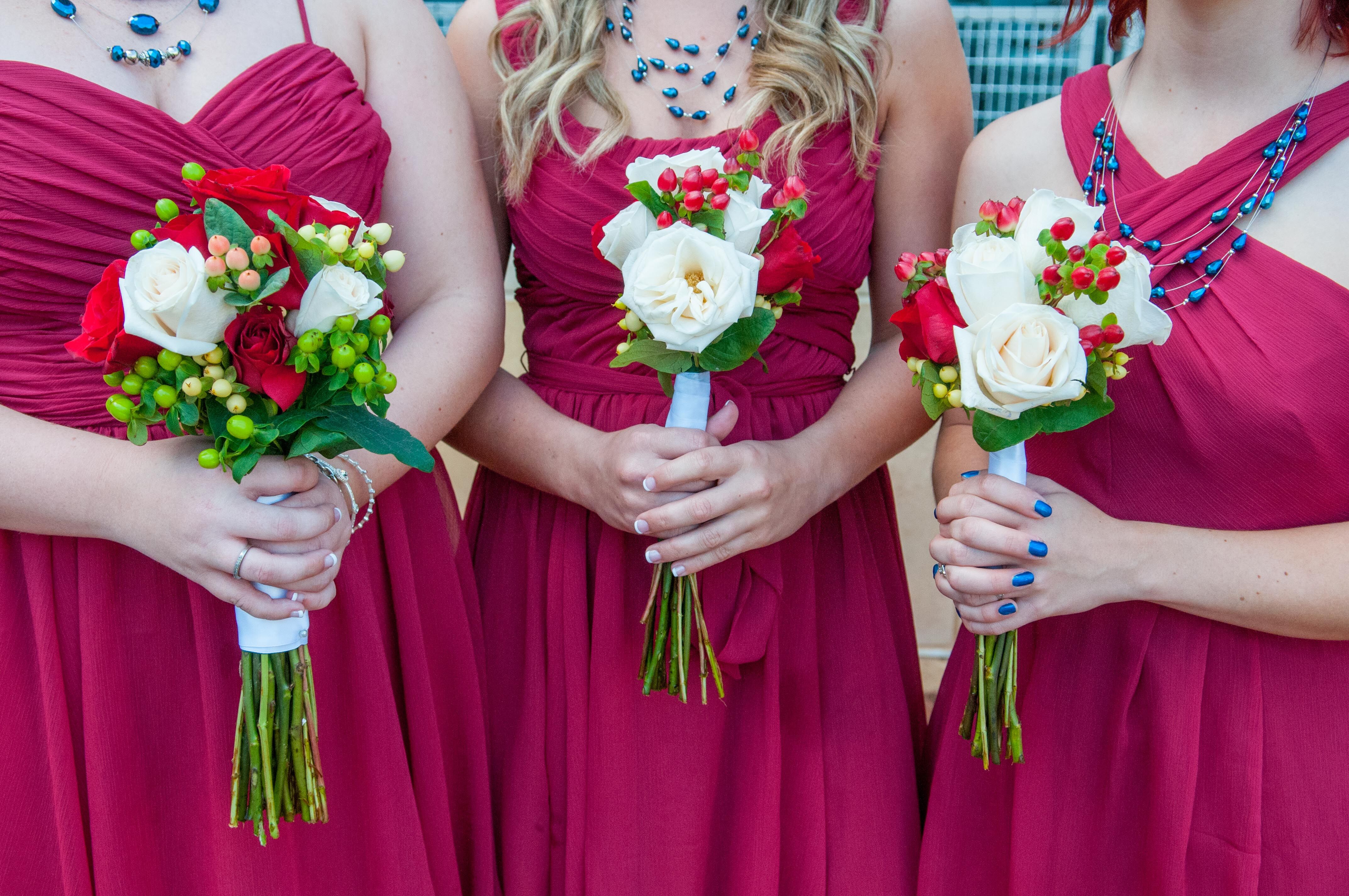 red bridesmaid bouquets