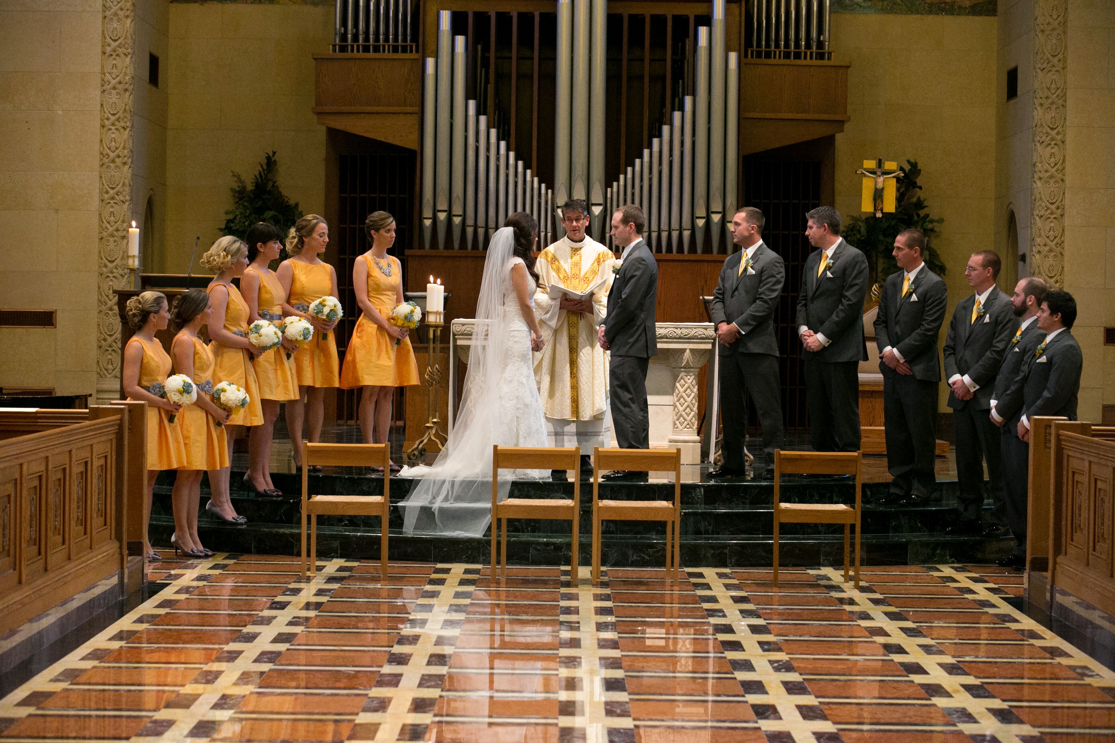 The Bride And Groom Taking Their Traditional Catholic Vows