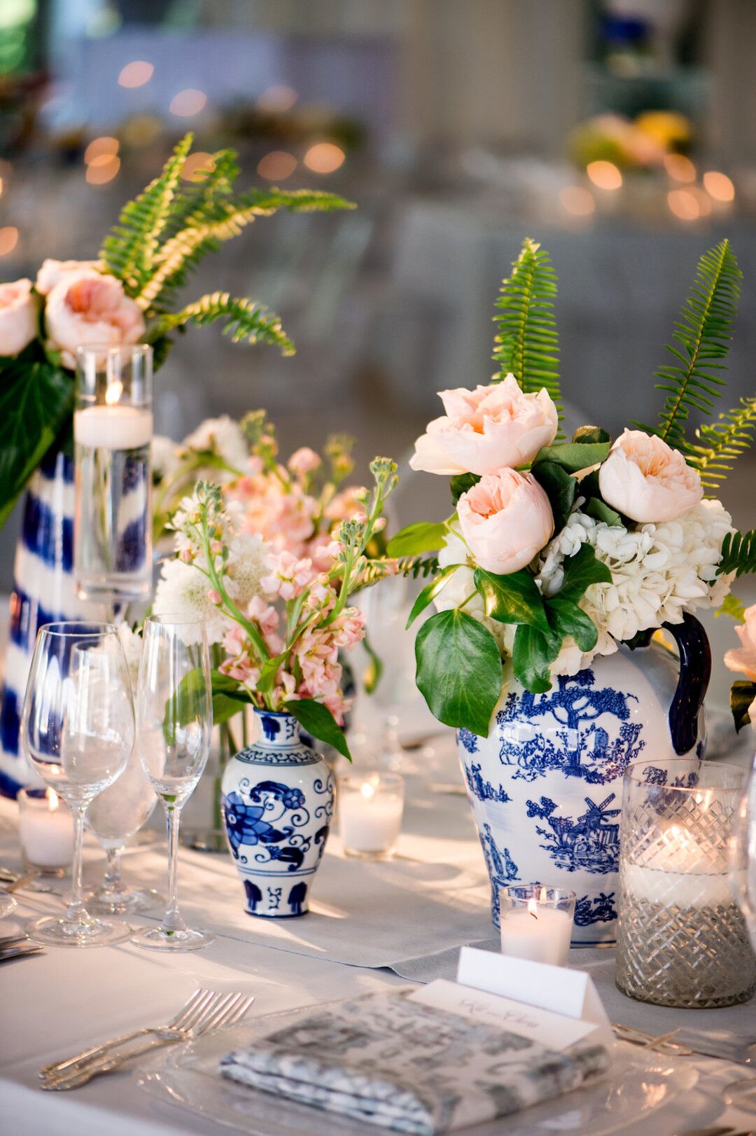 Roses, Hydrangeas and Tree Ivy in Ceramic Vases