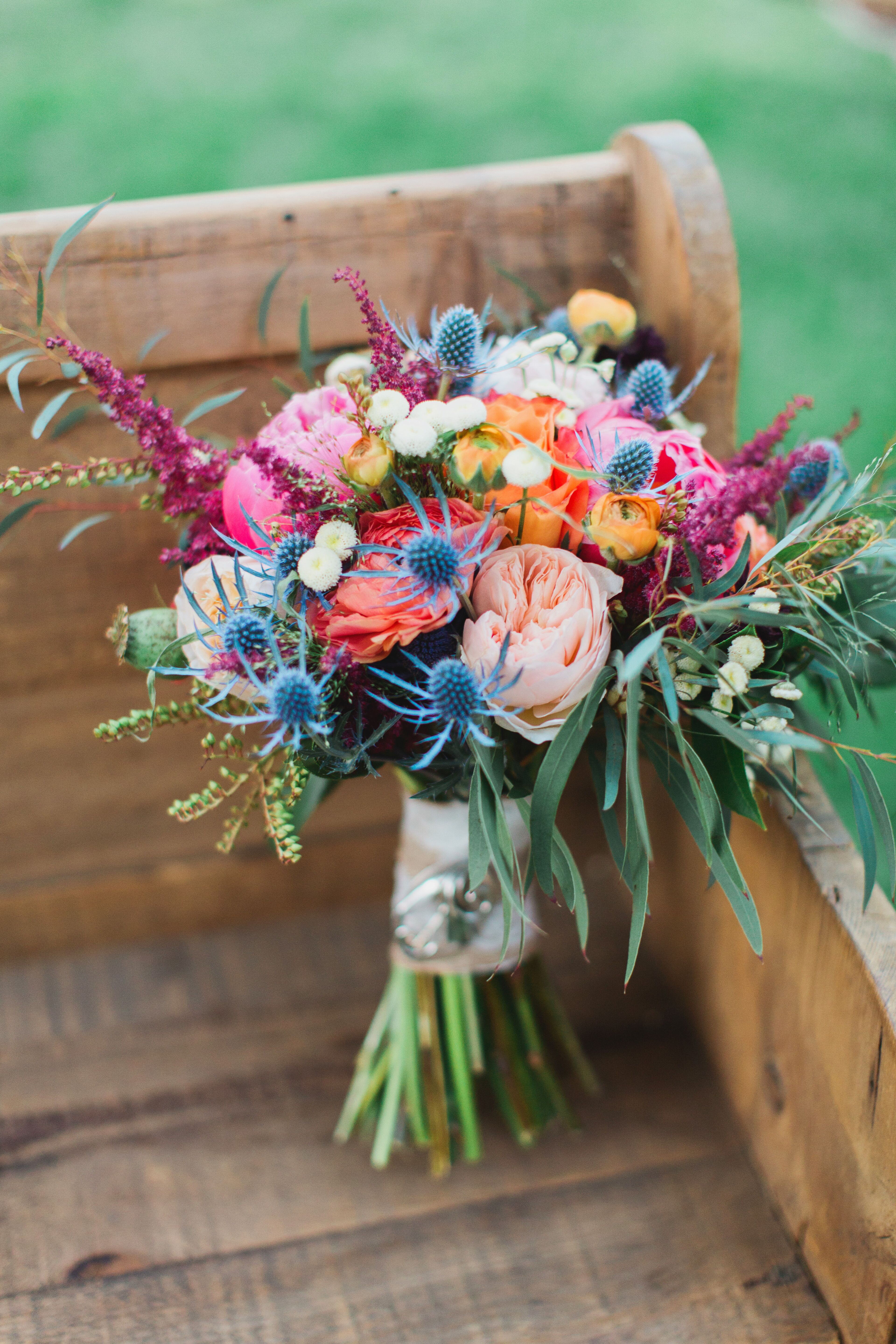 colorful-wild-bridal-bouquet-with-messy-greens