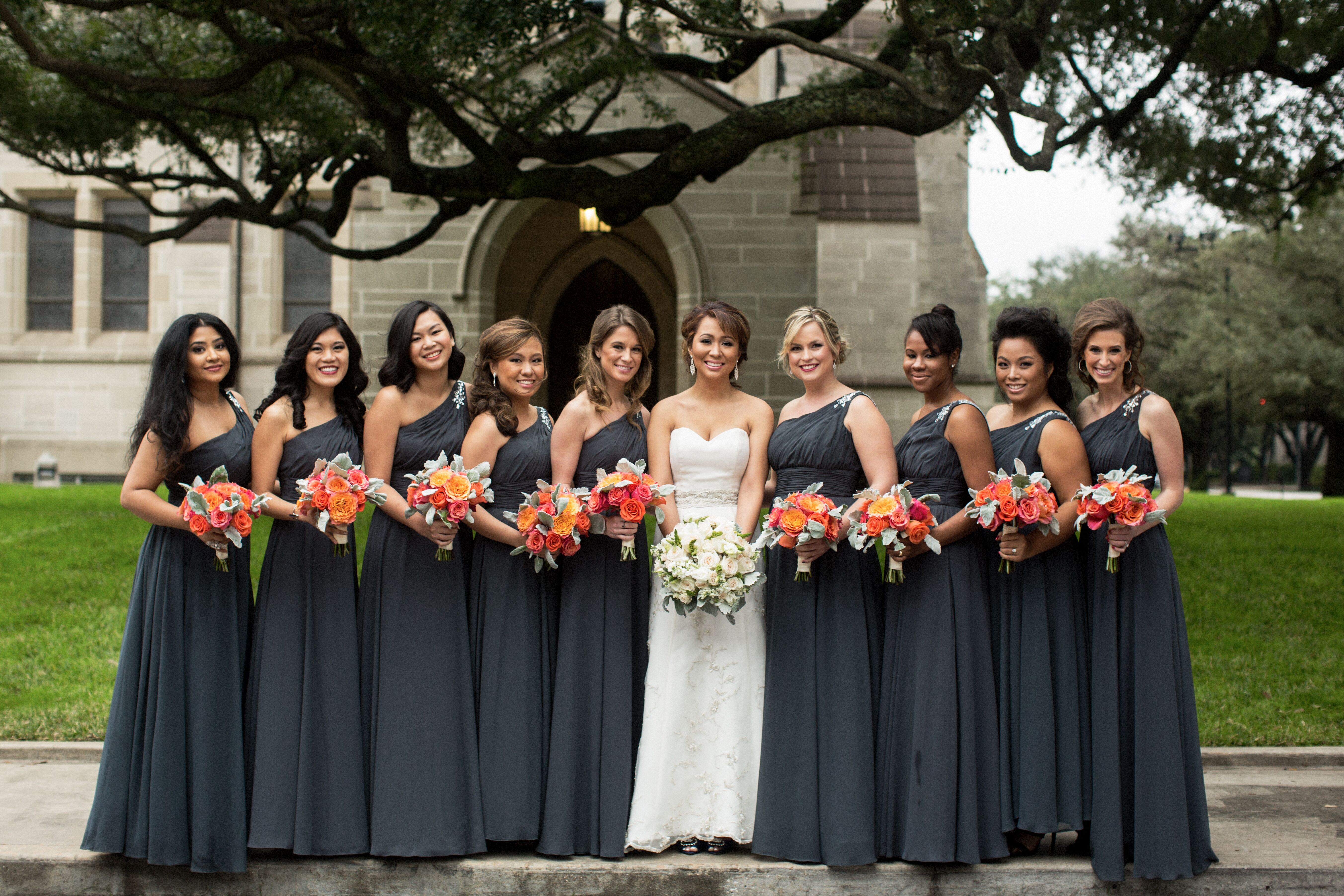 Dark Gray Bridesmaids Dresses with Tangerine Bouquets