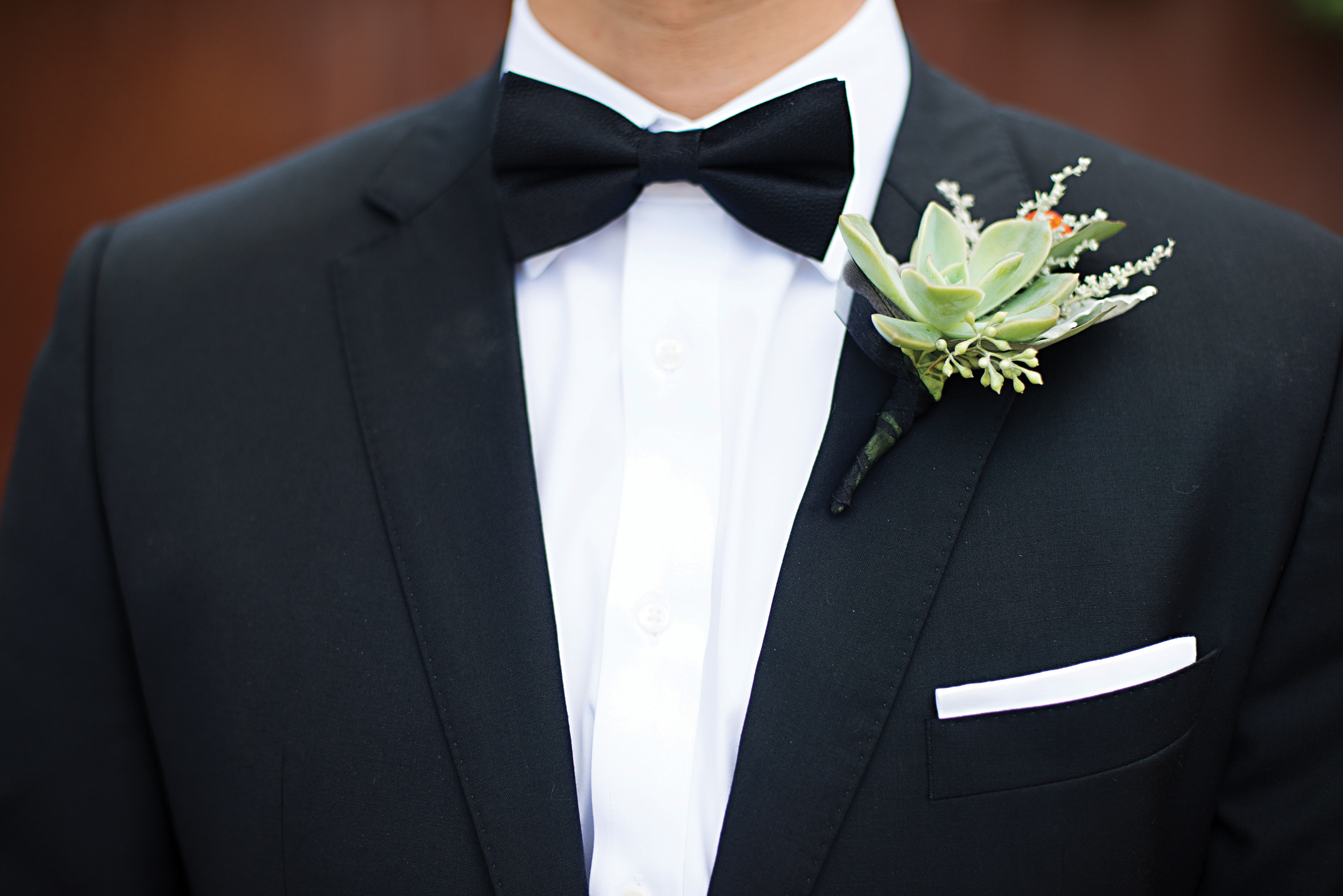 Green Succulent and Seeded Eucalyptus Boutonniere