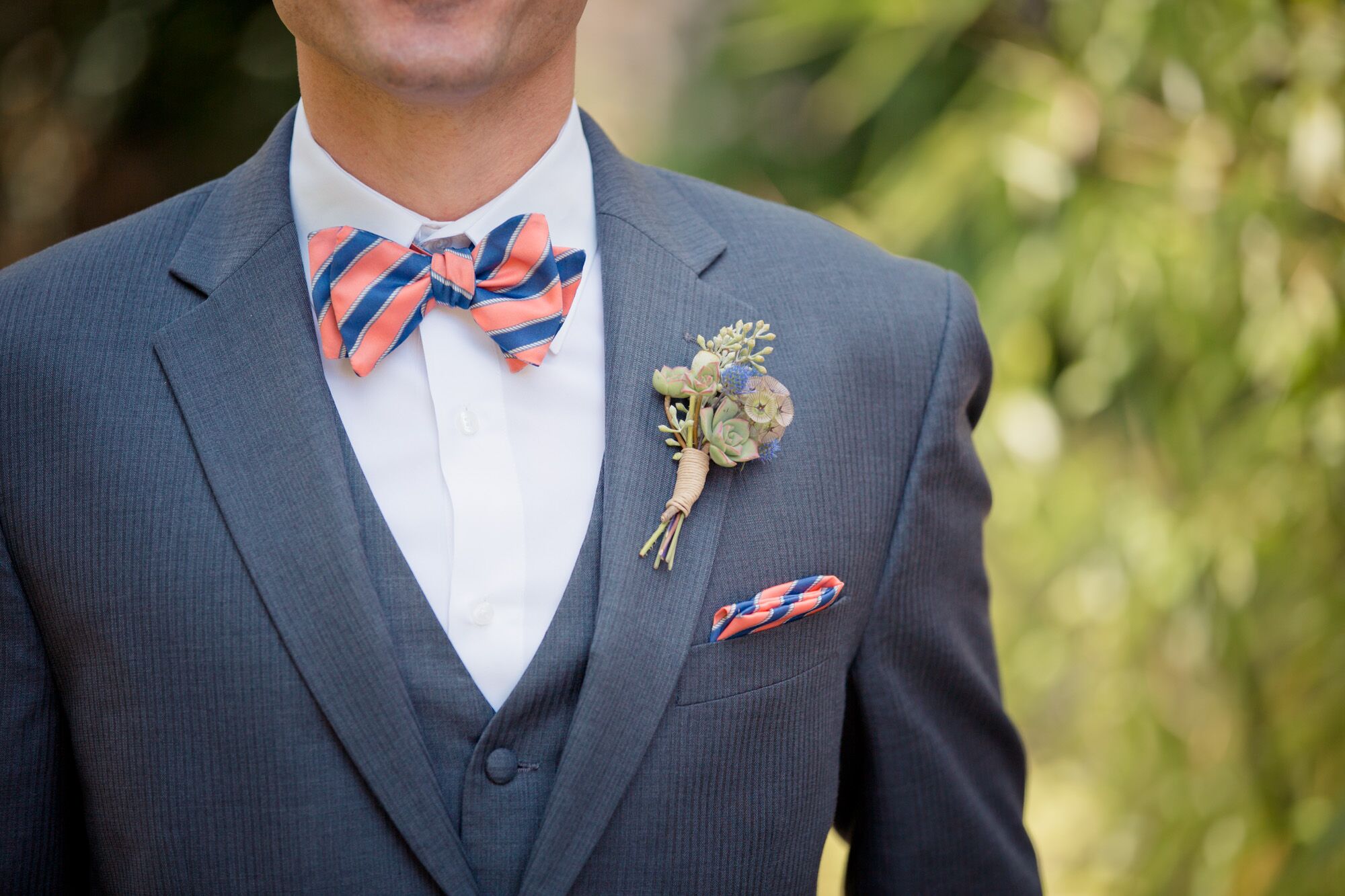 blue suit with peach shirt