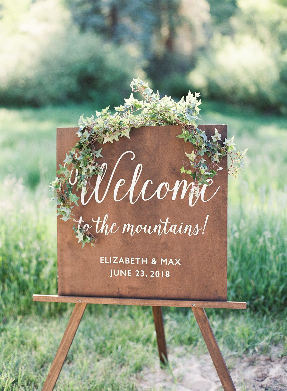 Rustic Wood Welcome Sign with Greenery