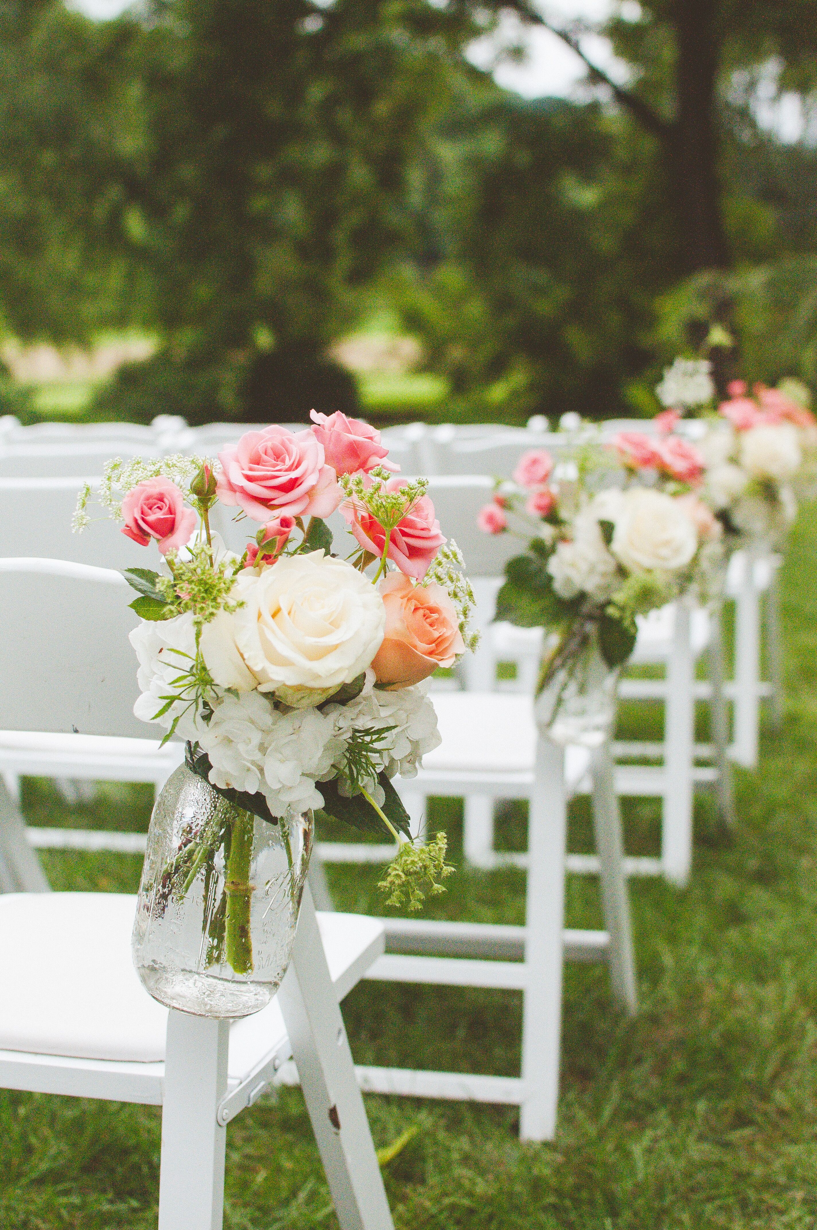 Coral and Ivory Rose Ceremony Aisle Decor