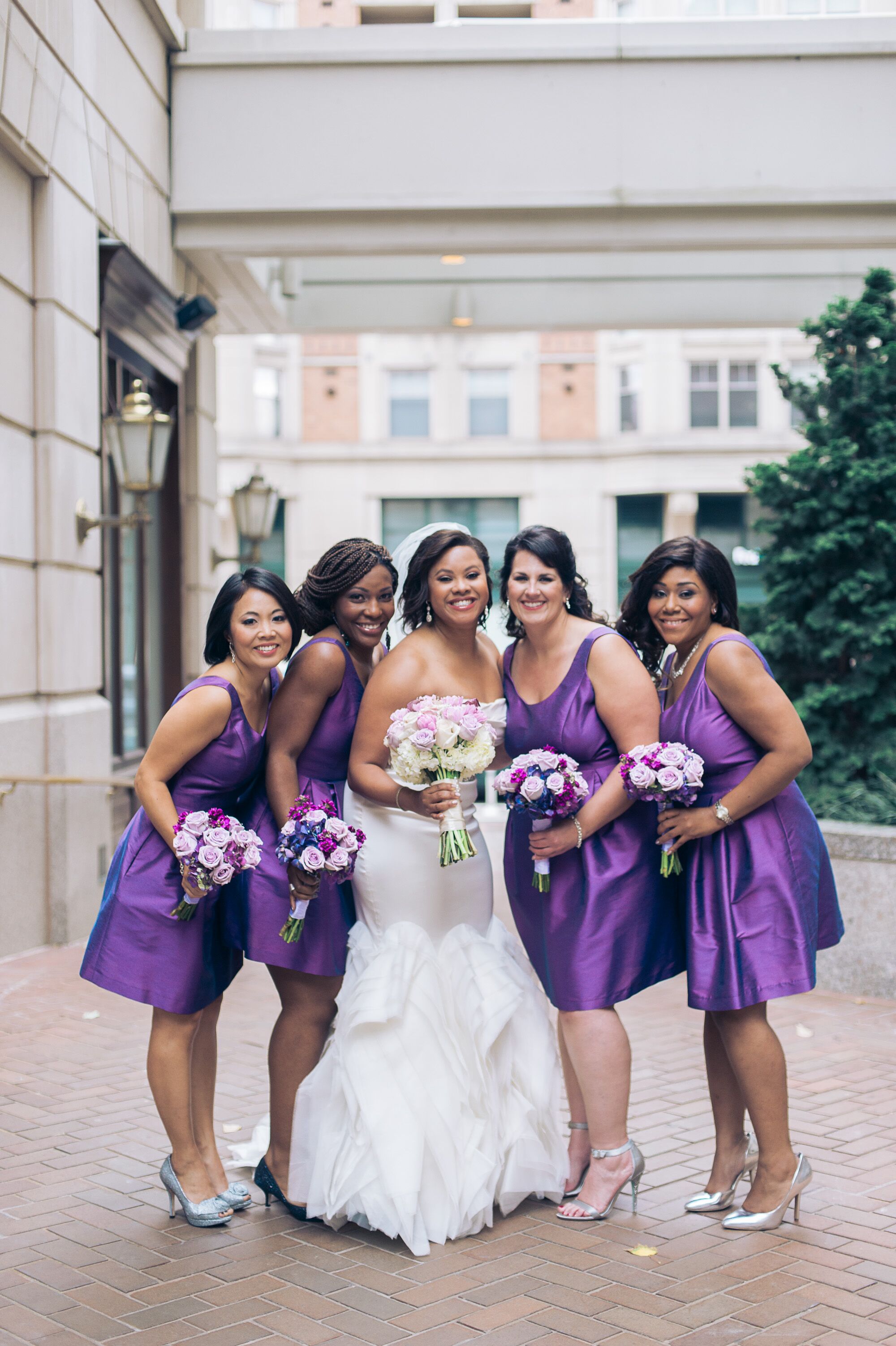 Bridesmaids in Purple Satin Dresses