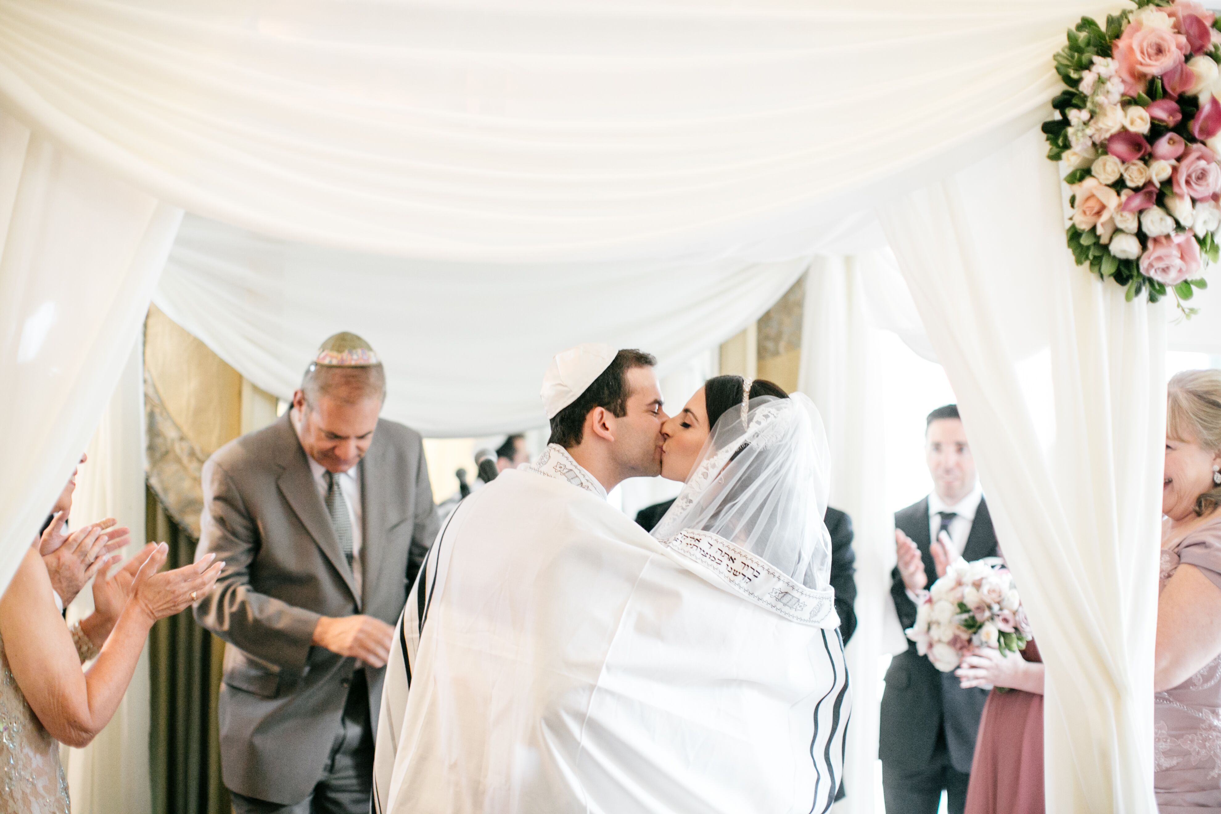 First Kiss at Traditional Jewish Ceremony at Omni HOtel