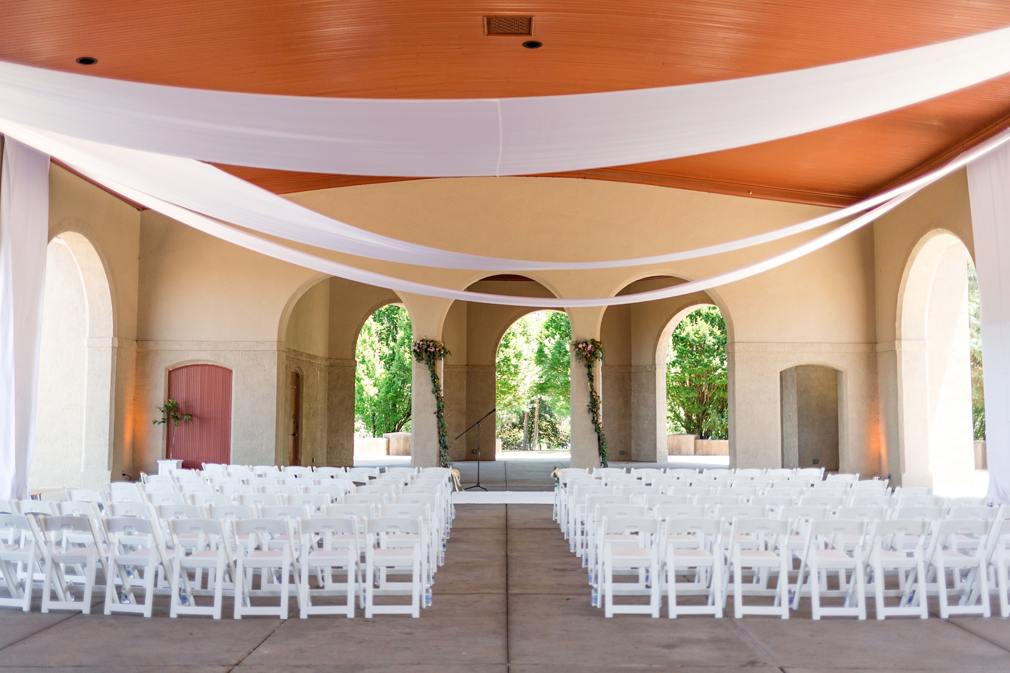 Simple Ceremony Setup with Draping at World's Fair Pavilion in St. Louis
