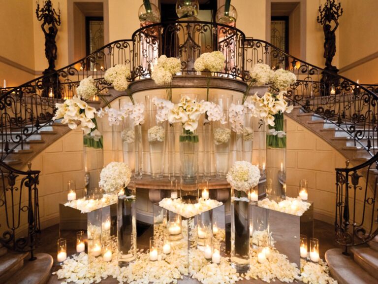 Bryan Rafanelli's luxe reception entrance with mirrors and candles