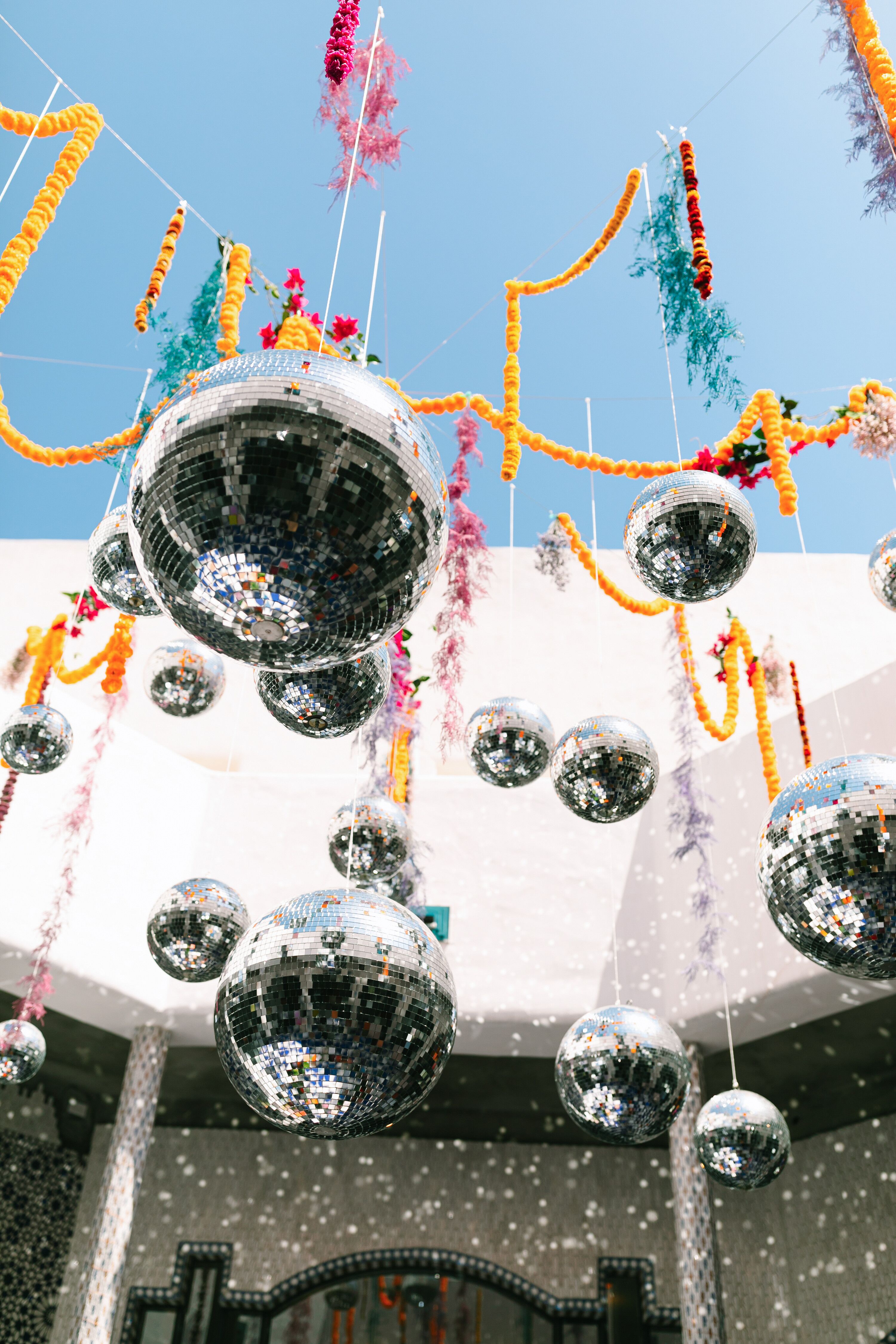 Disco Ball and Garland Hanging Installation at The Hummingbird Temple ...